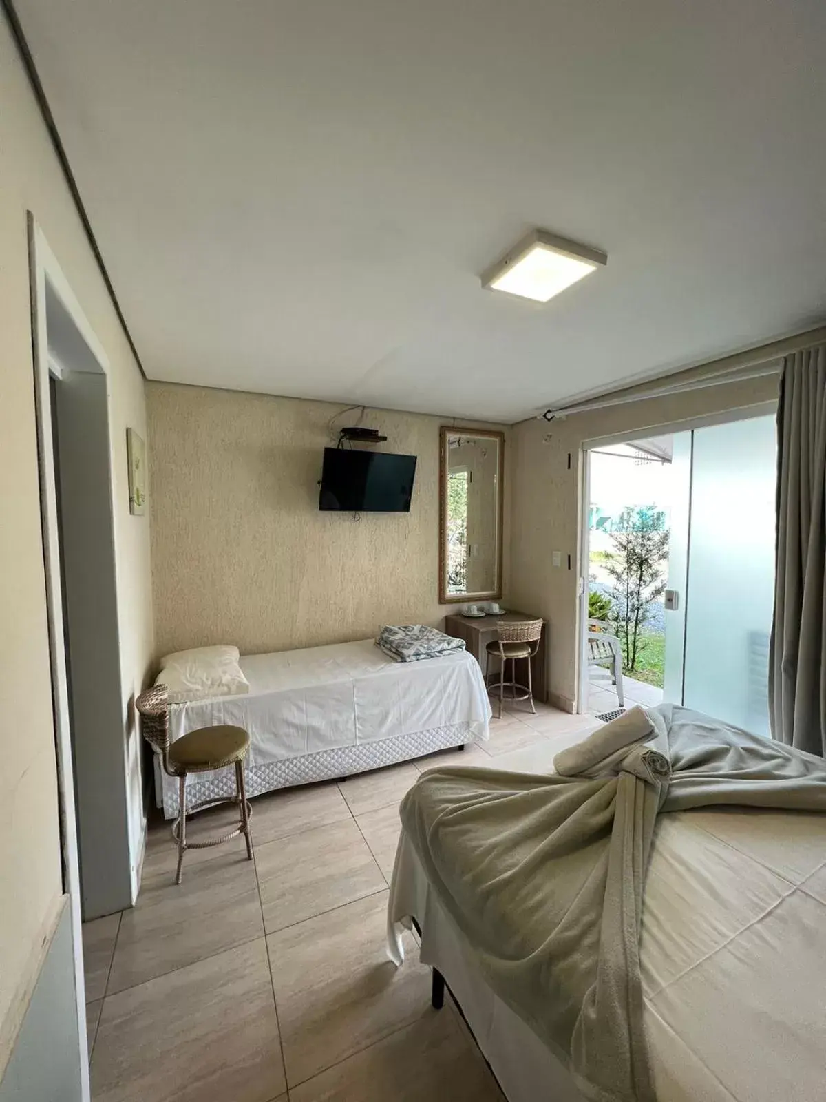 Budget Triple Room in Pousada Recanto Armação Budget Triple Room in Pousada Recanto Armação