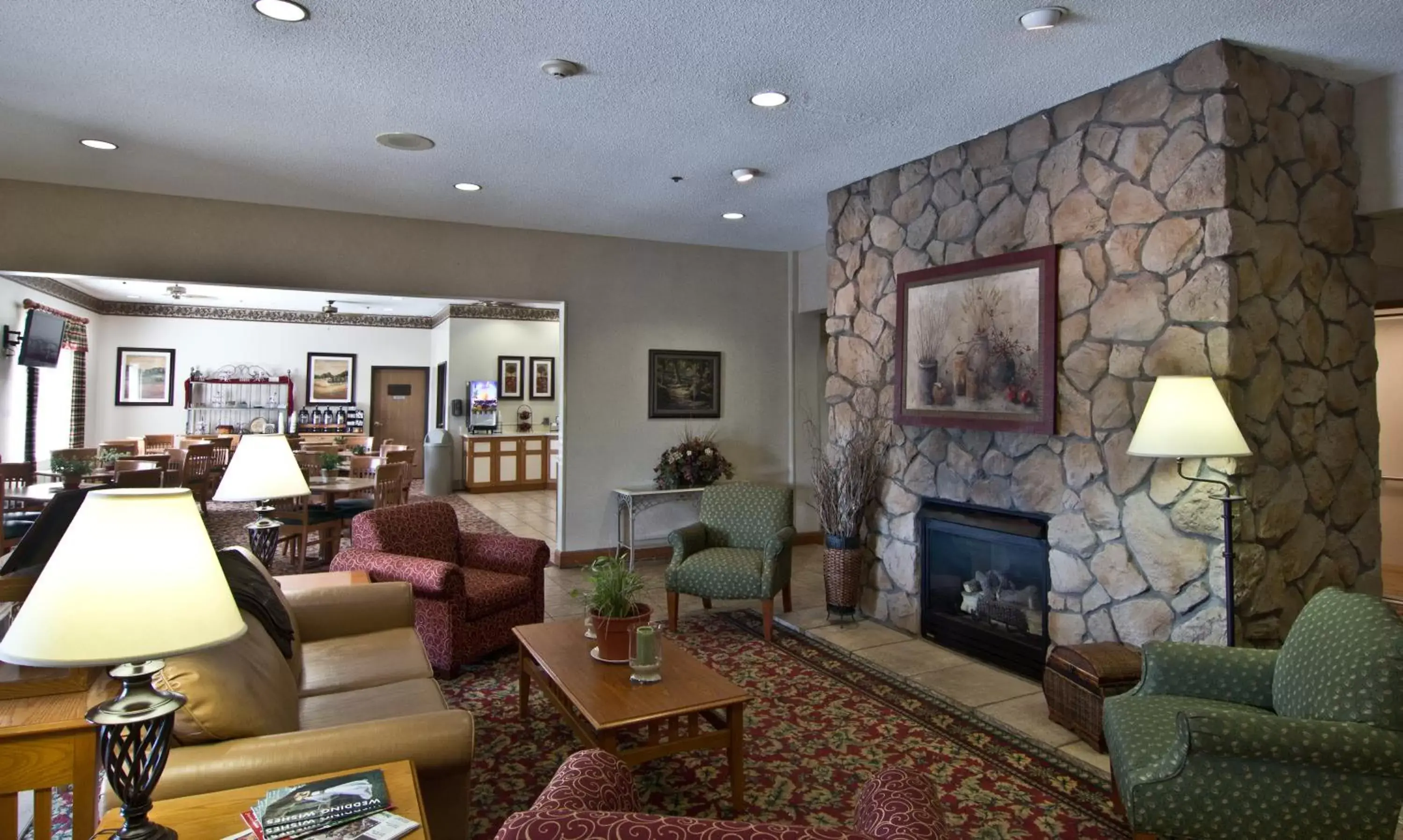Lobby or reception, Lounge/Bar in Coshocton Village Inn & Suites