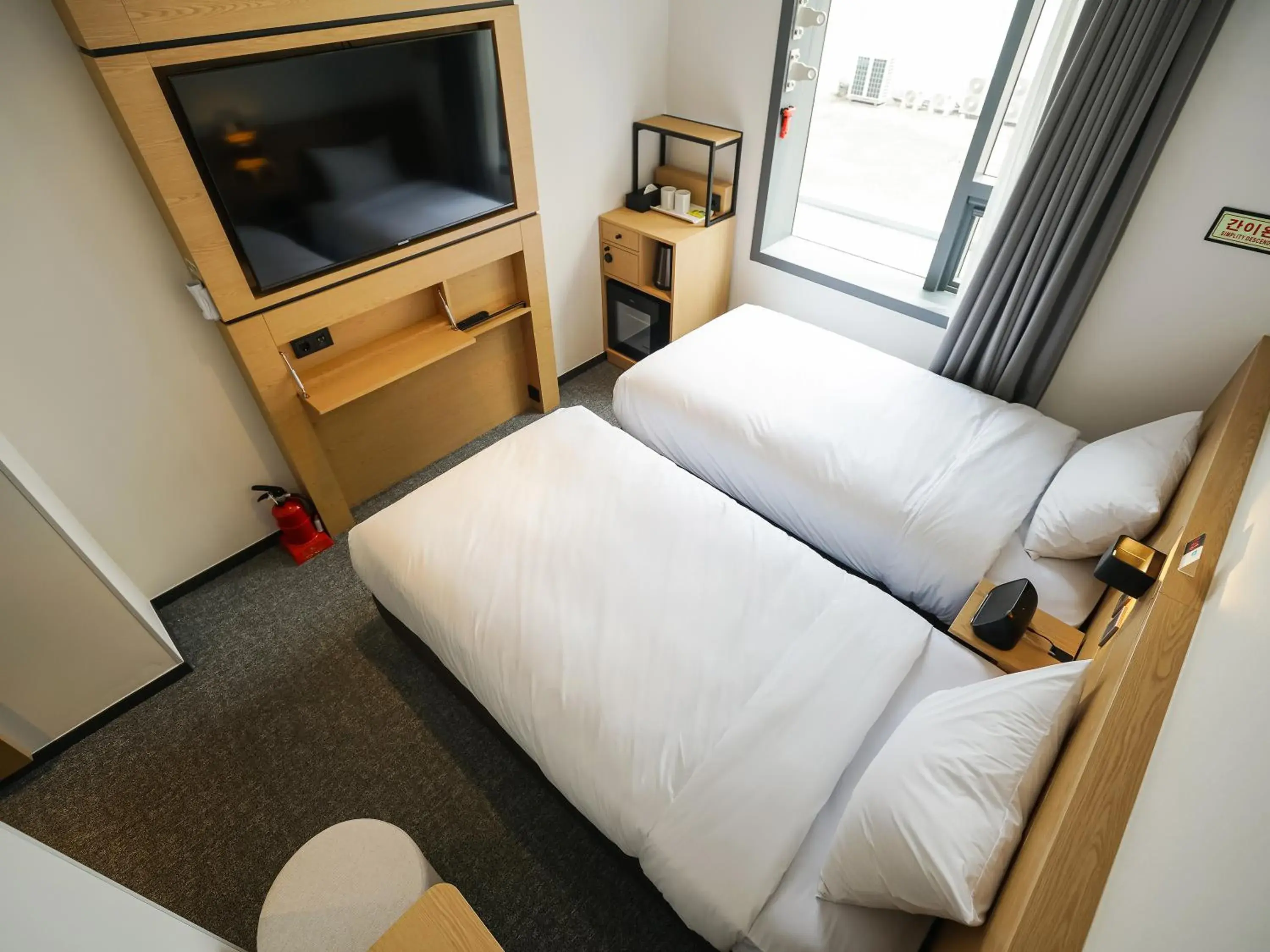 Bed in Henn na Hotel Seoul Myeongdong