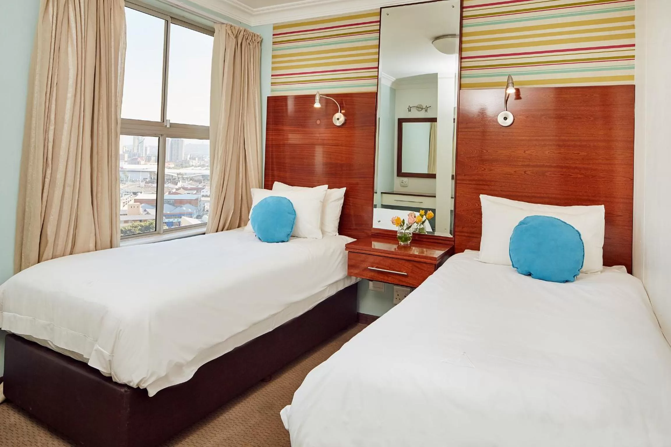 Bed in First Group The Palace All-Suite