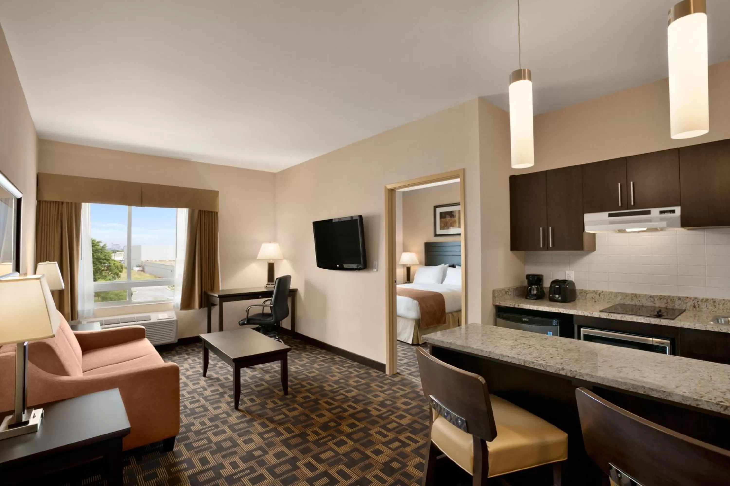 Kitchen or kitchenette in Days Inn & Suites by Wyndham Winnipeg Airport Manitoba
