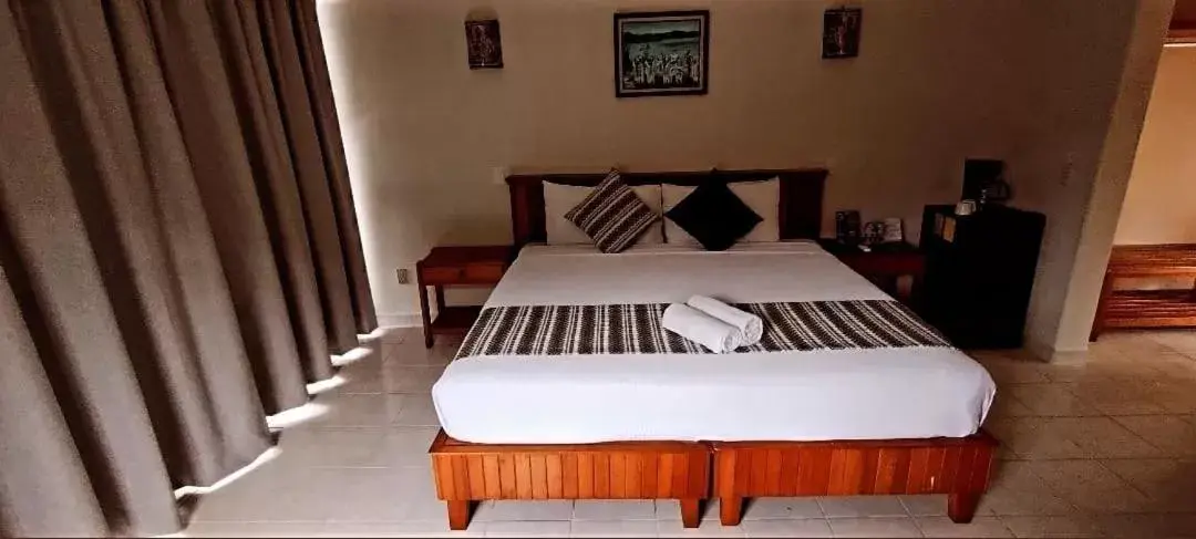 Bed in Hotel Villas Ema