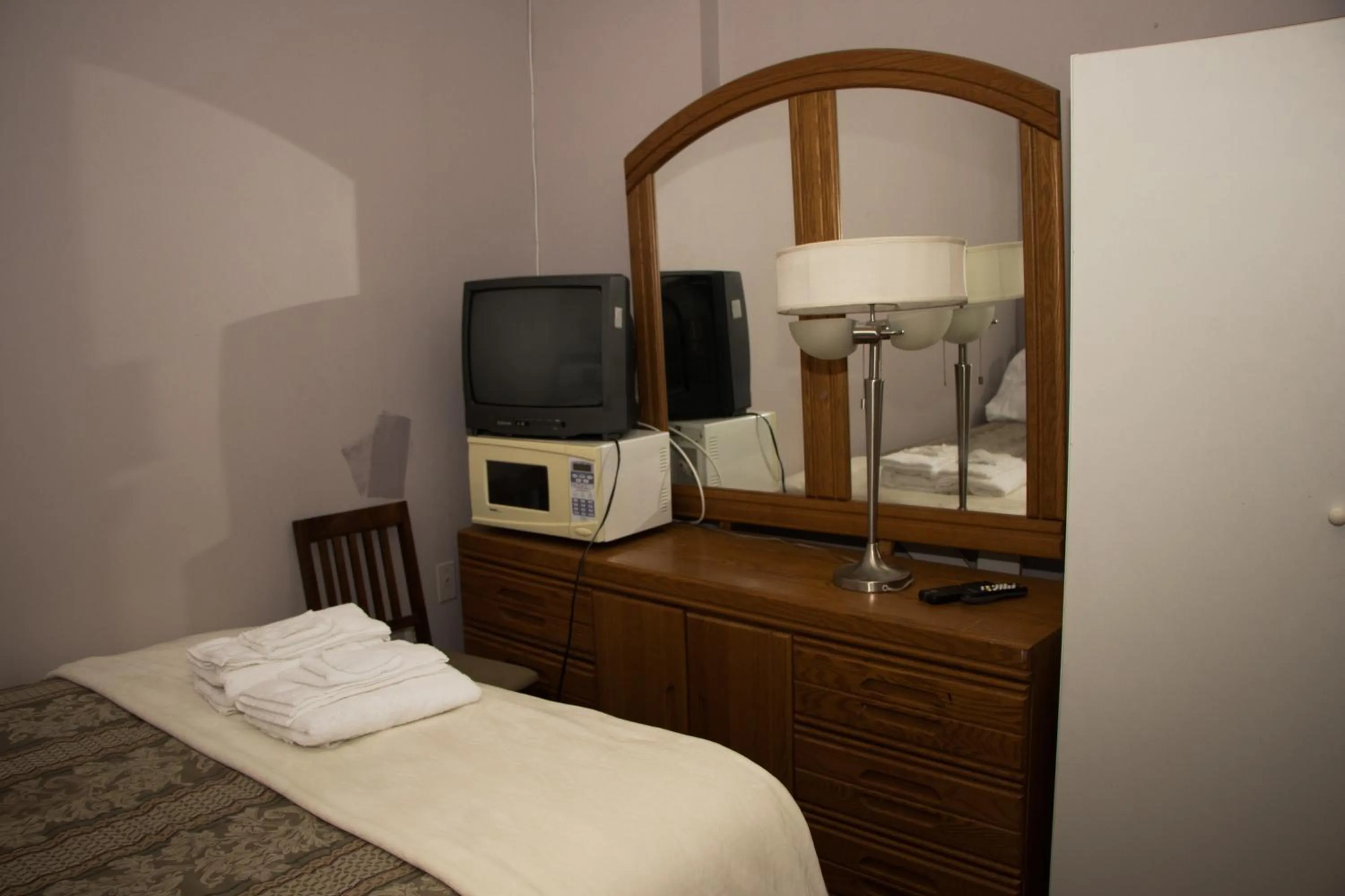 Bed in Saint Lawrence Residences and Suites