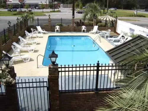 Swimming pool, Pool View in Travelers Inn & Suites