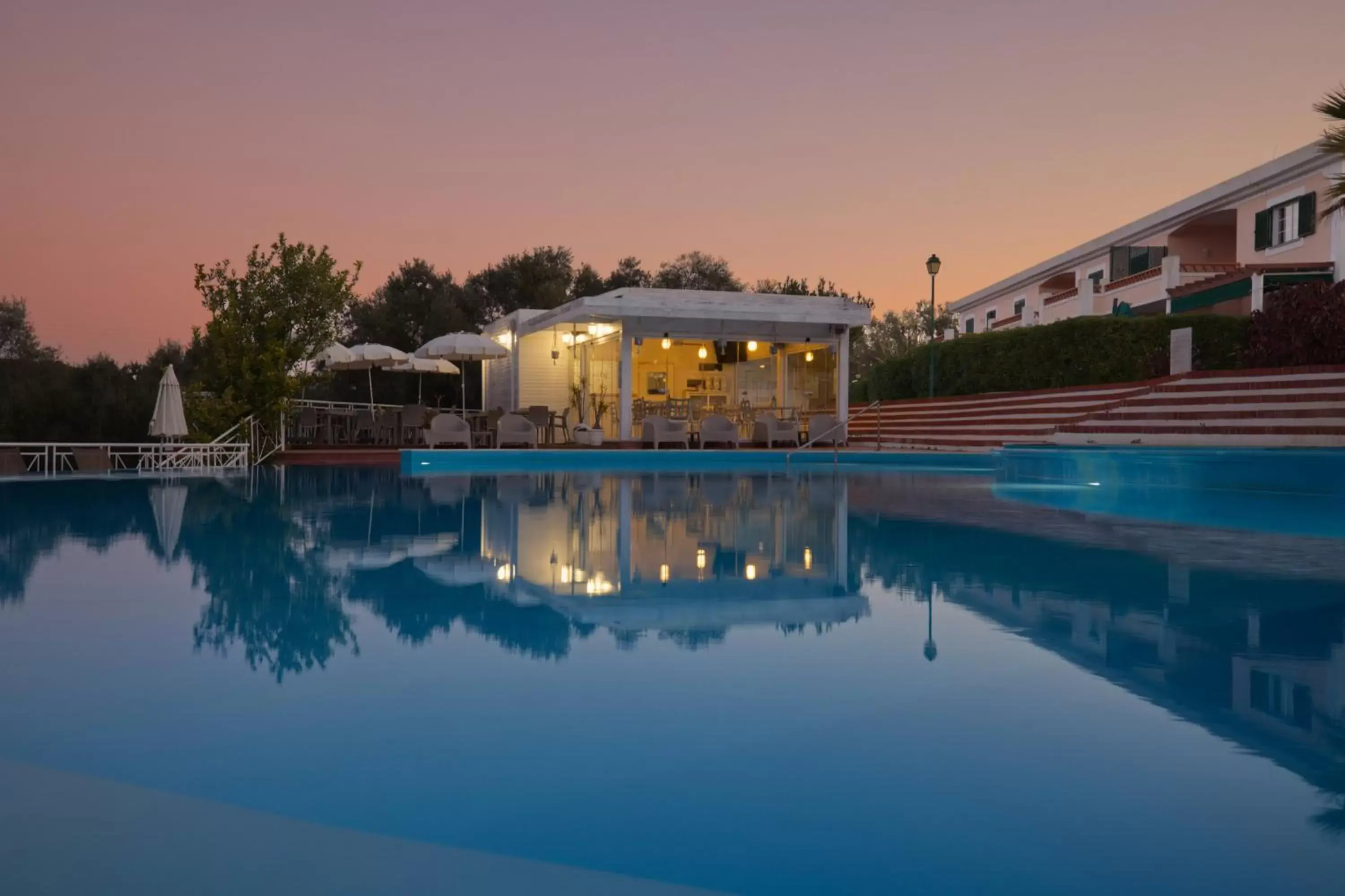 Sunset, Swimming Pool in Cegonha Country Club