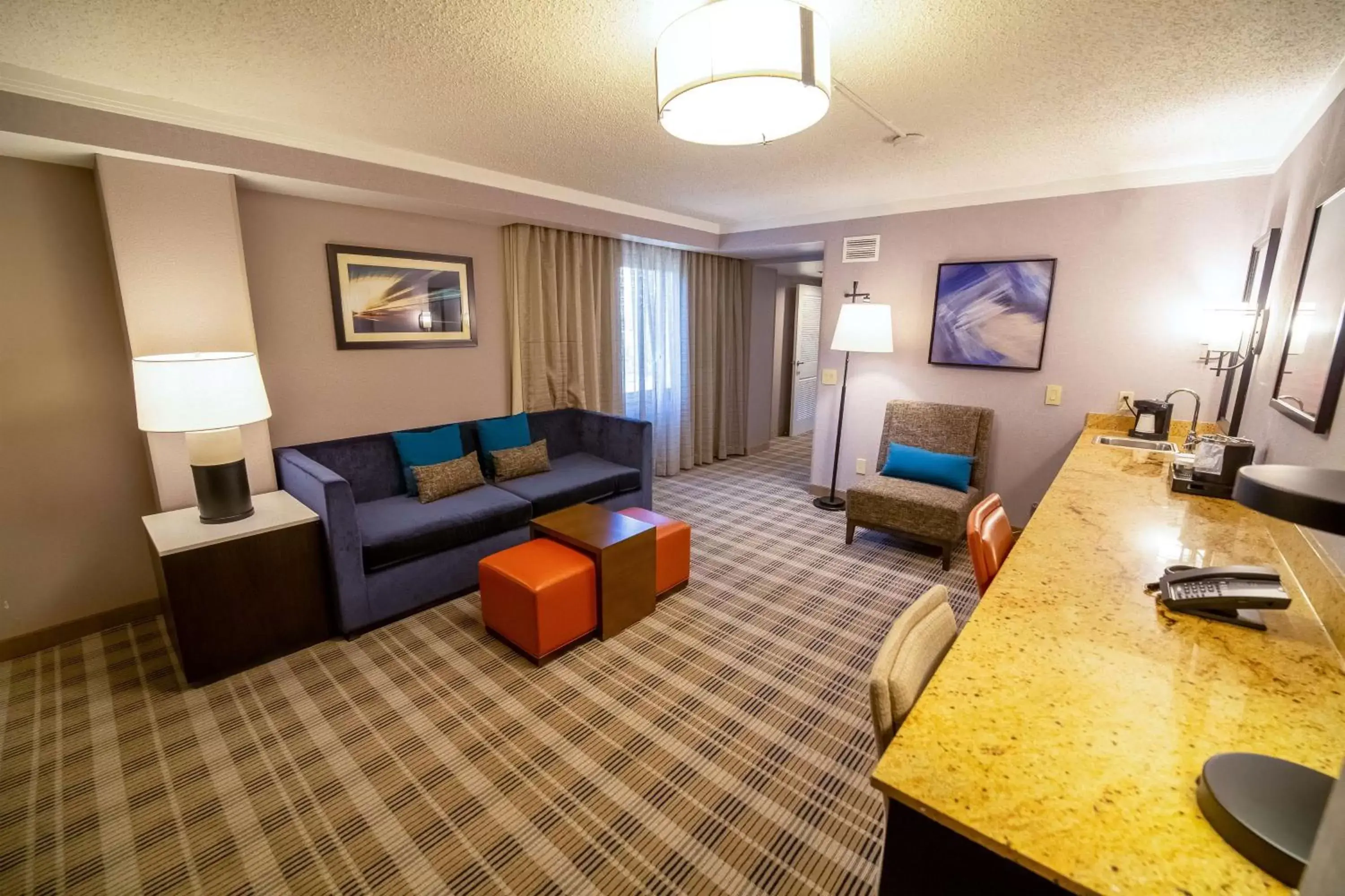 Bedroom, Seating Area in Embassy Suites by Hilton Kansas City Overland Park