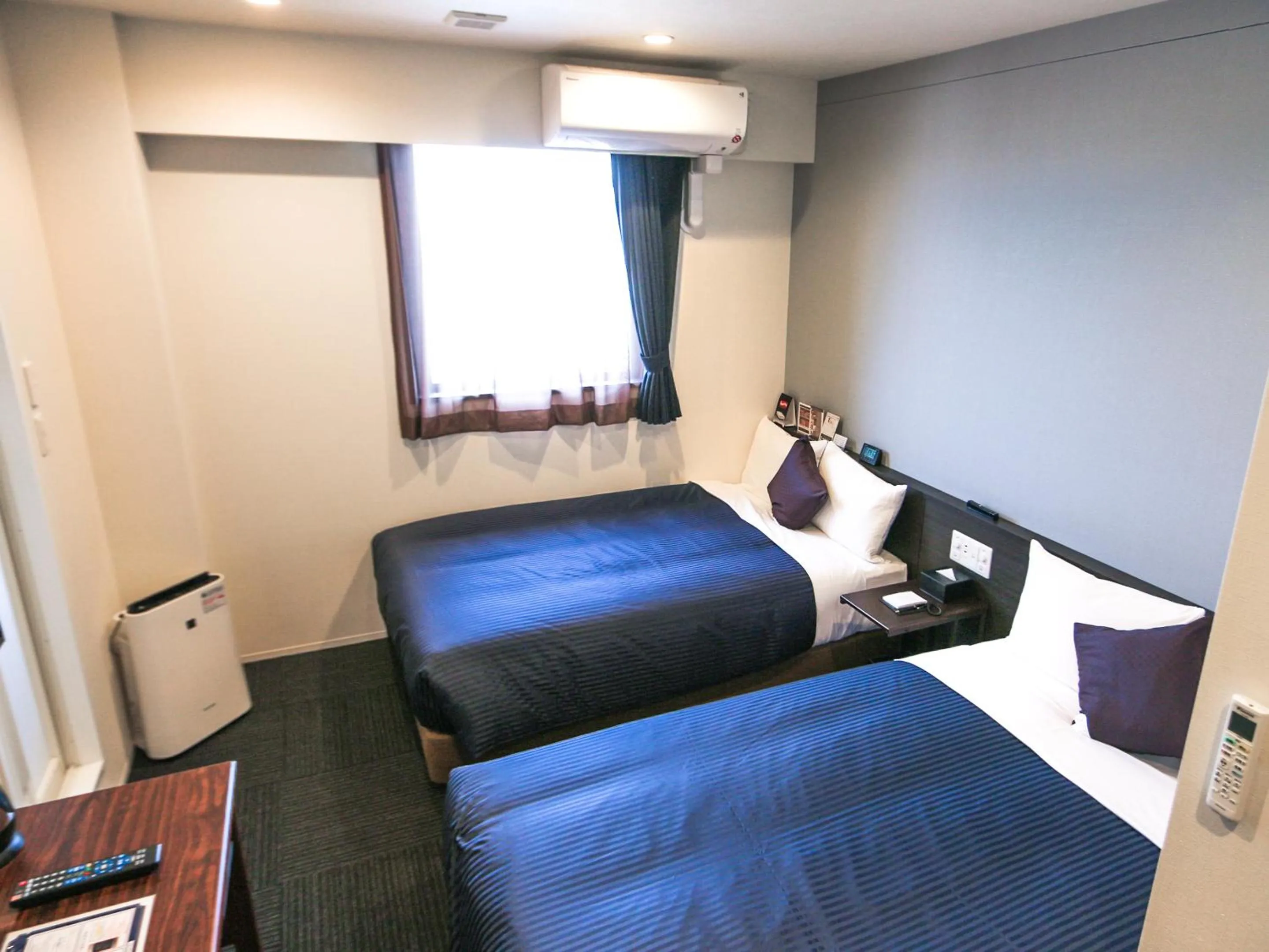 Bed in HOTEL LiVEMAX Tokyo Ayase-Ekimae