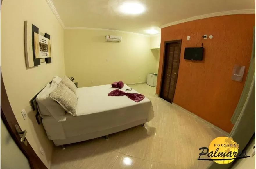 Bed in Pousada Palmares
