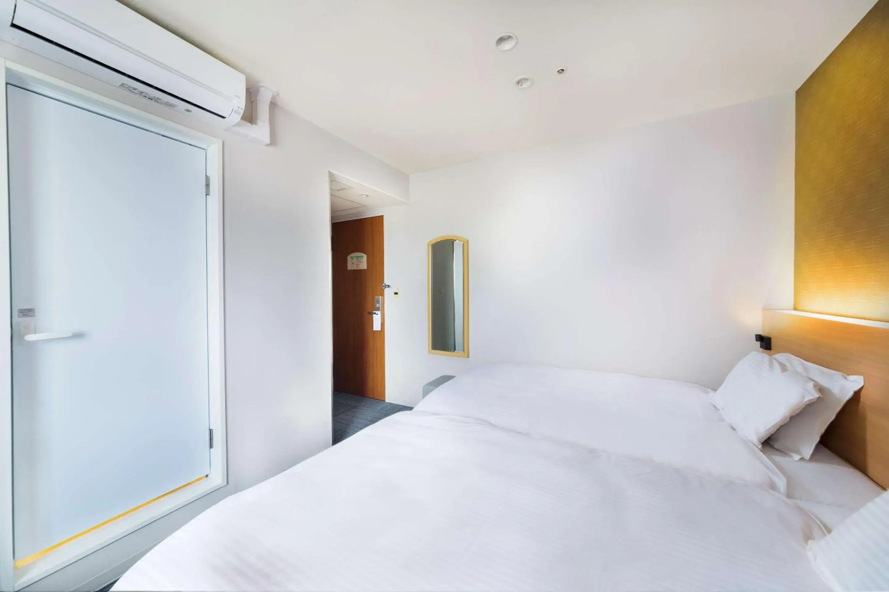 Bathroom, Bed in SureStay Plus Hotel by Best Western Shin-Osaka