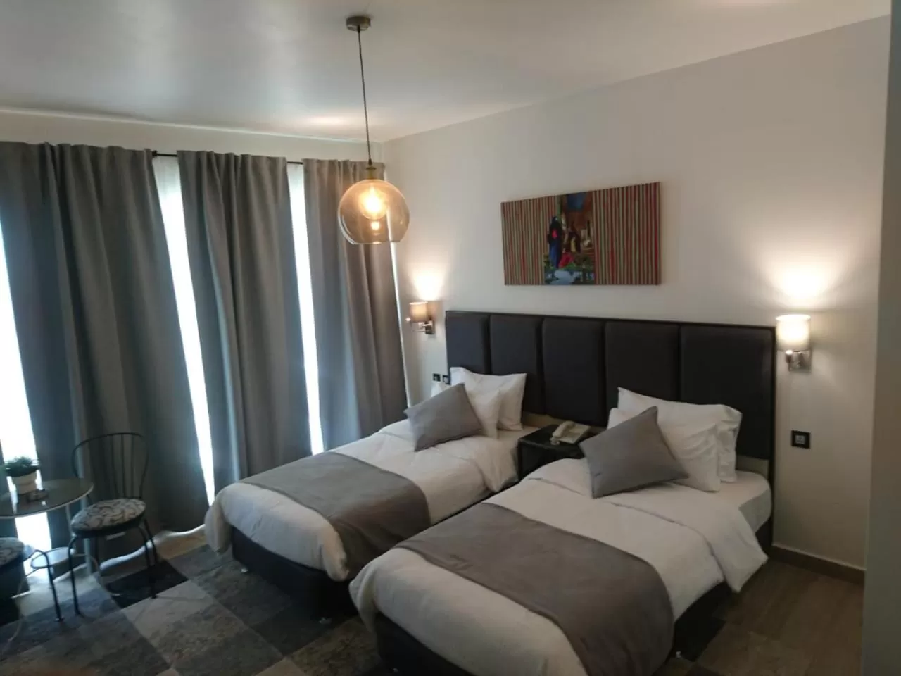 Dining area, Bed in The Conroy Boutique Hotel