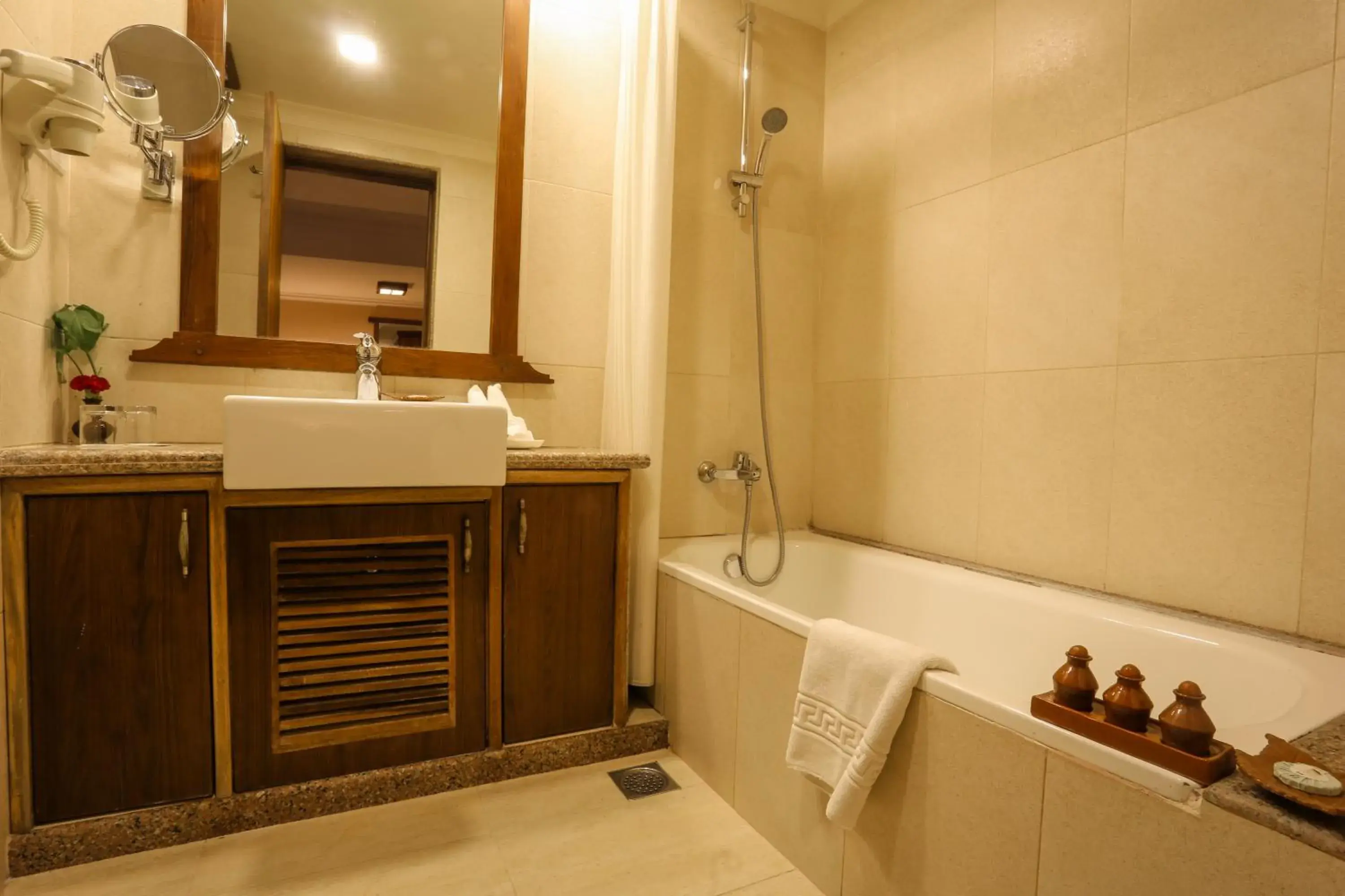 Bathroom in Atithi Resort & Spa