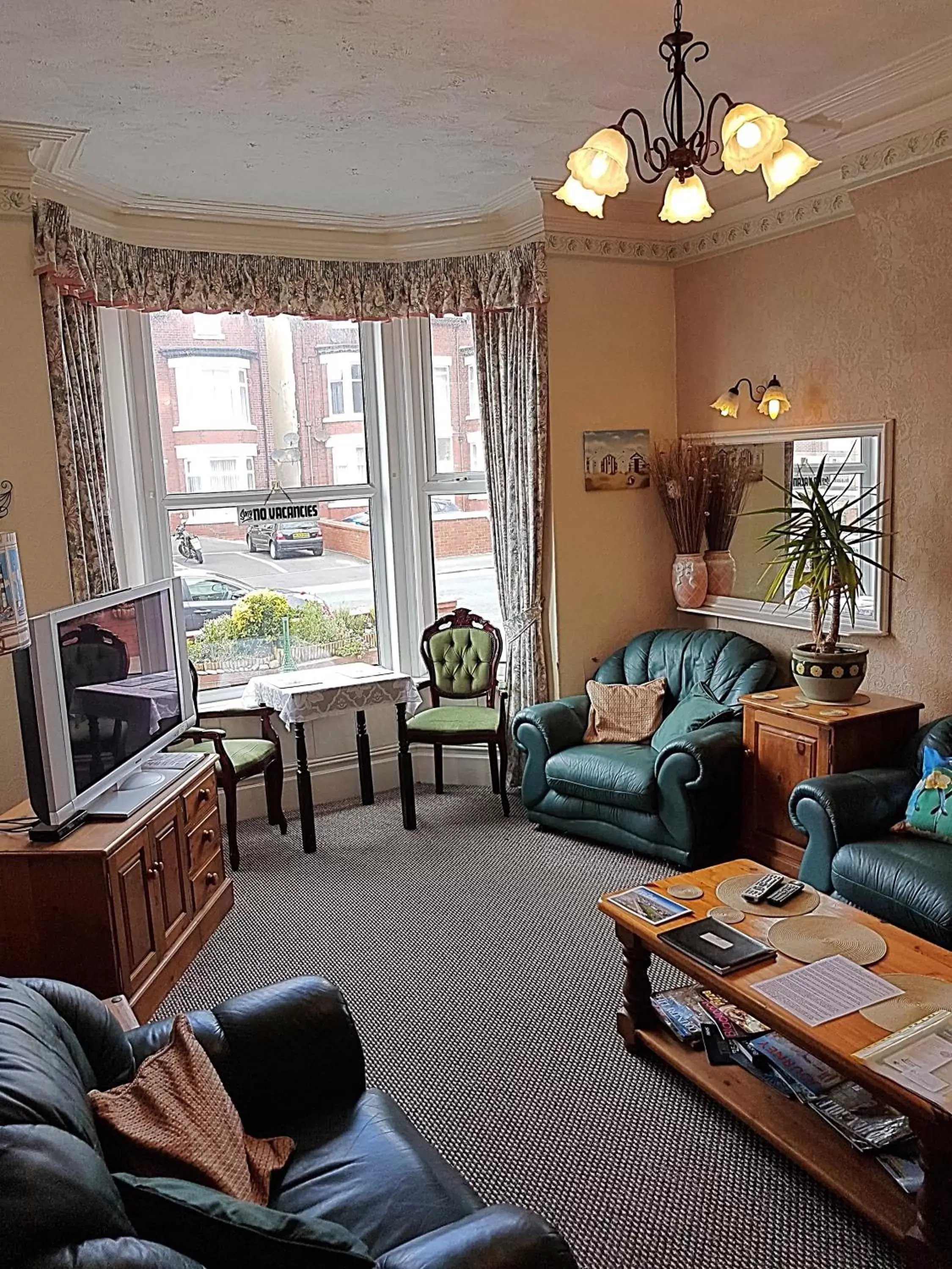 Communal lounge/ TV room in Cumbria Guest House