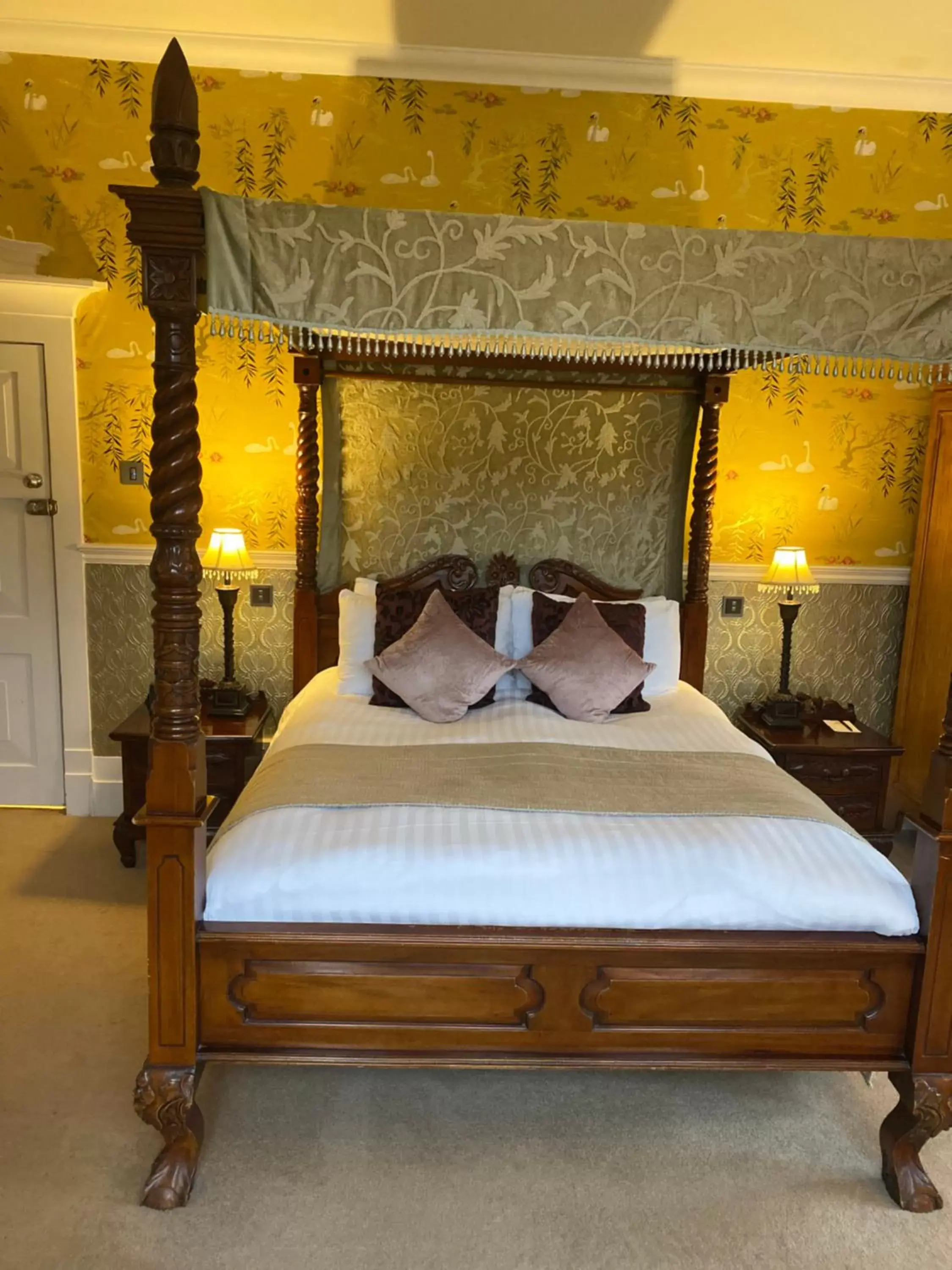 Bed in Langtry Manor Hotel