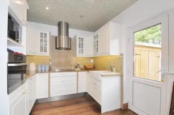 Kitchen/Kitchenette in TJ Homes - Luxury Studio Suite with Garden View - Next to tube station London