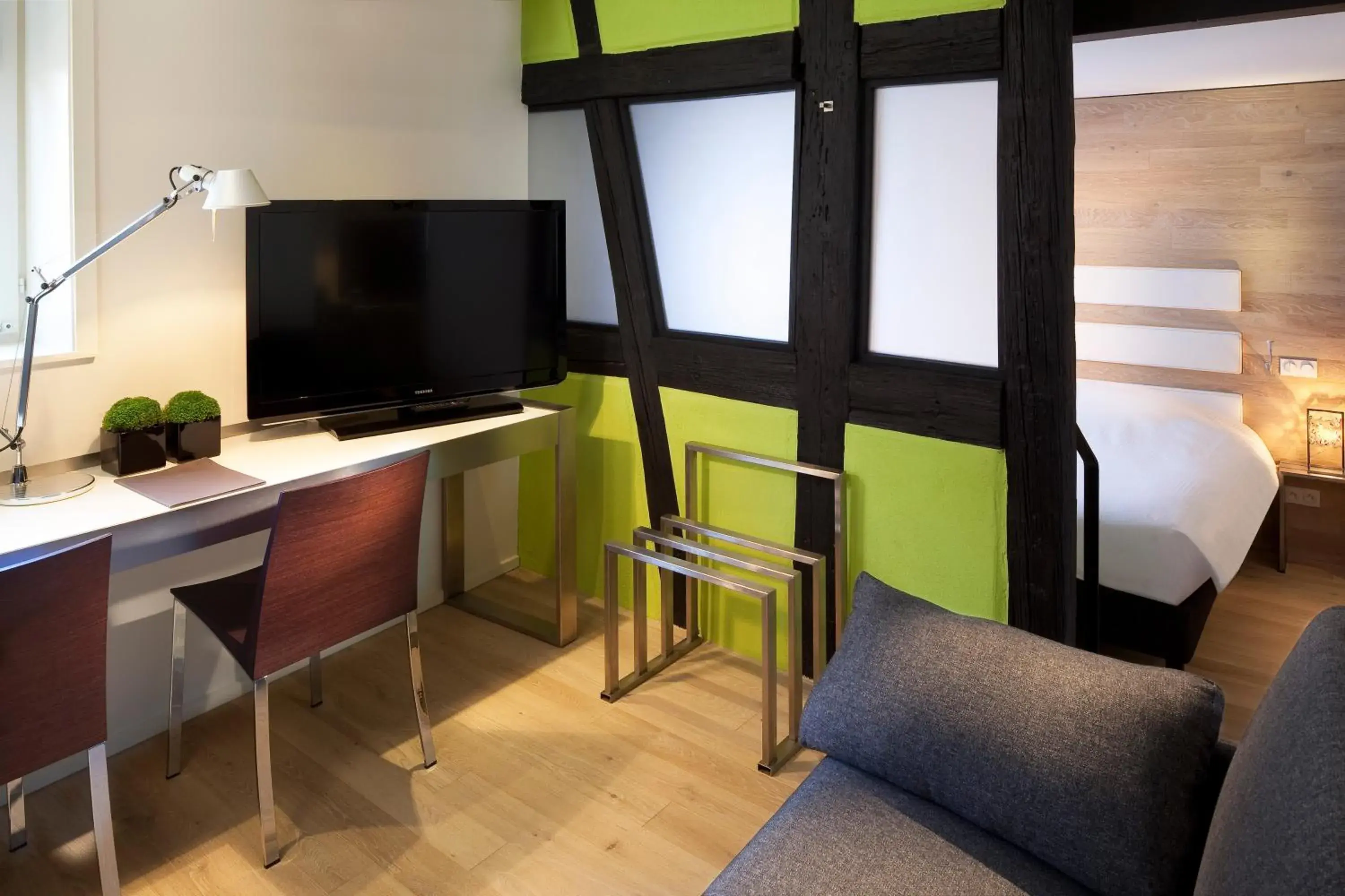 TV and multimedia, TV/Entertainment Center in Hotel Le Colombier Suites