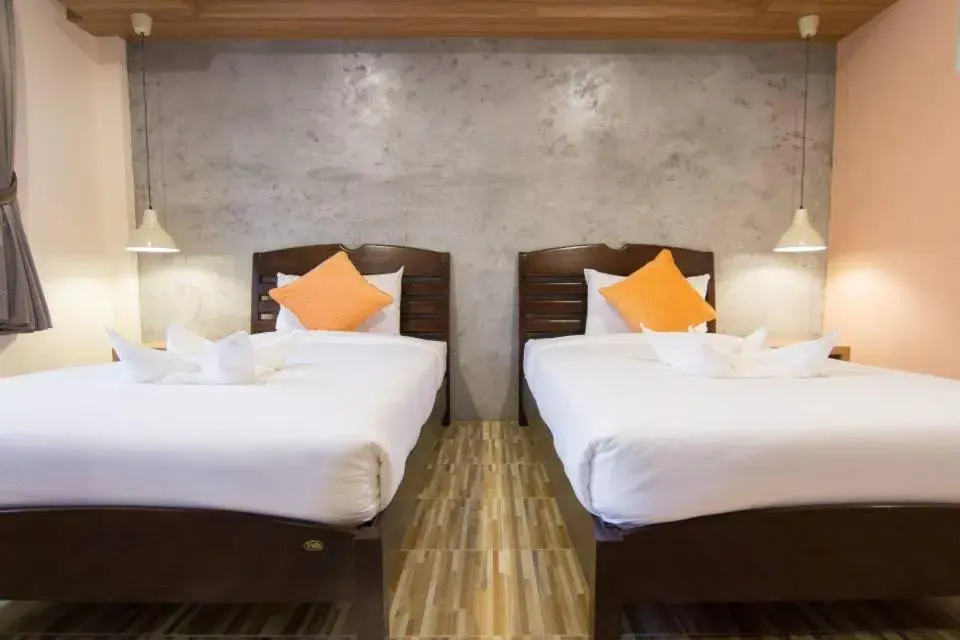 Bed in K.L. Boutique Hotel