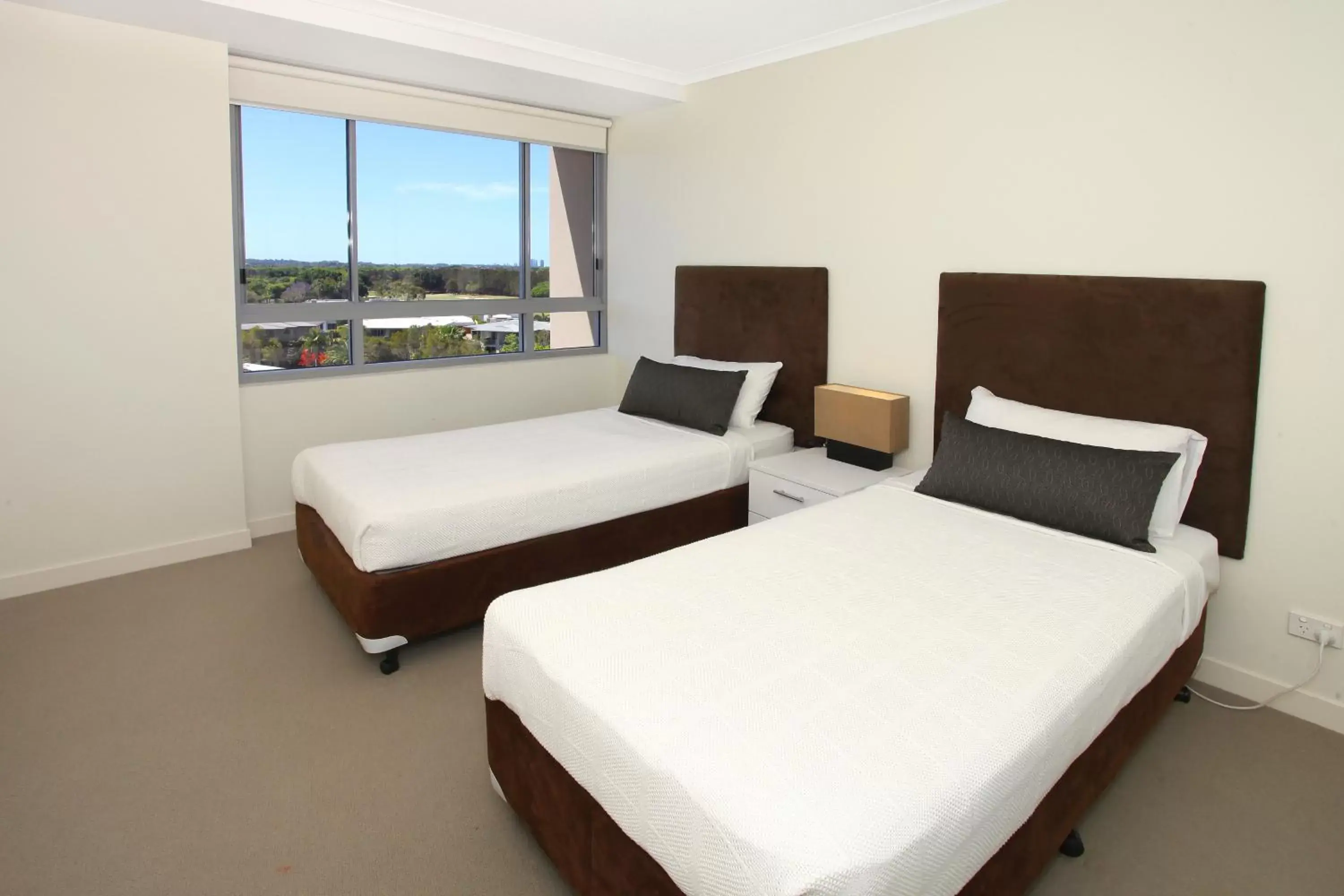 Bed in Signature Waterfront Apartments Bed in Signature Waterfront Apartments