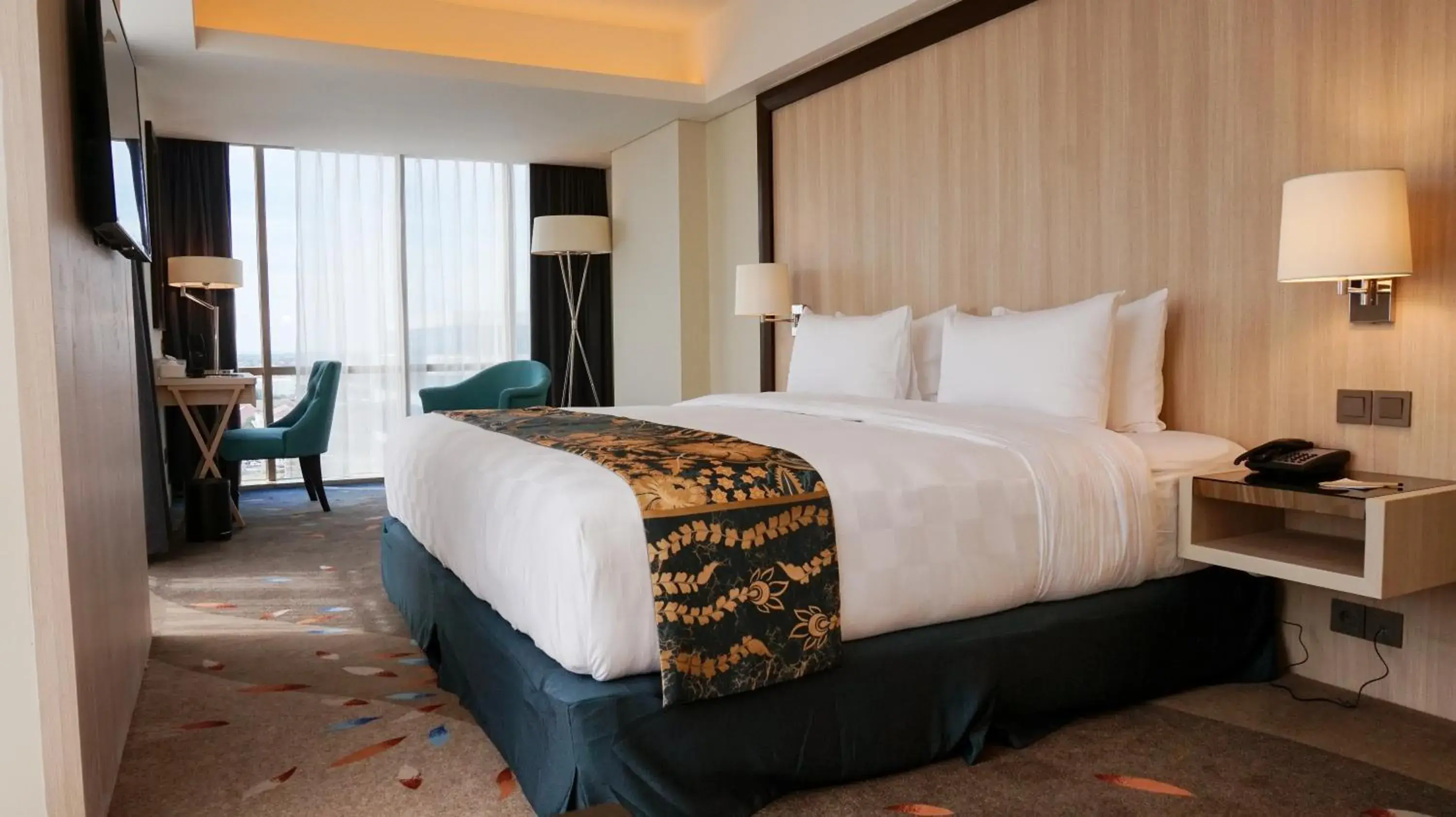 Bed in Louis Kienne Hotel Pandanaran Bed in Louis Kienne Hotel Pandanaran