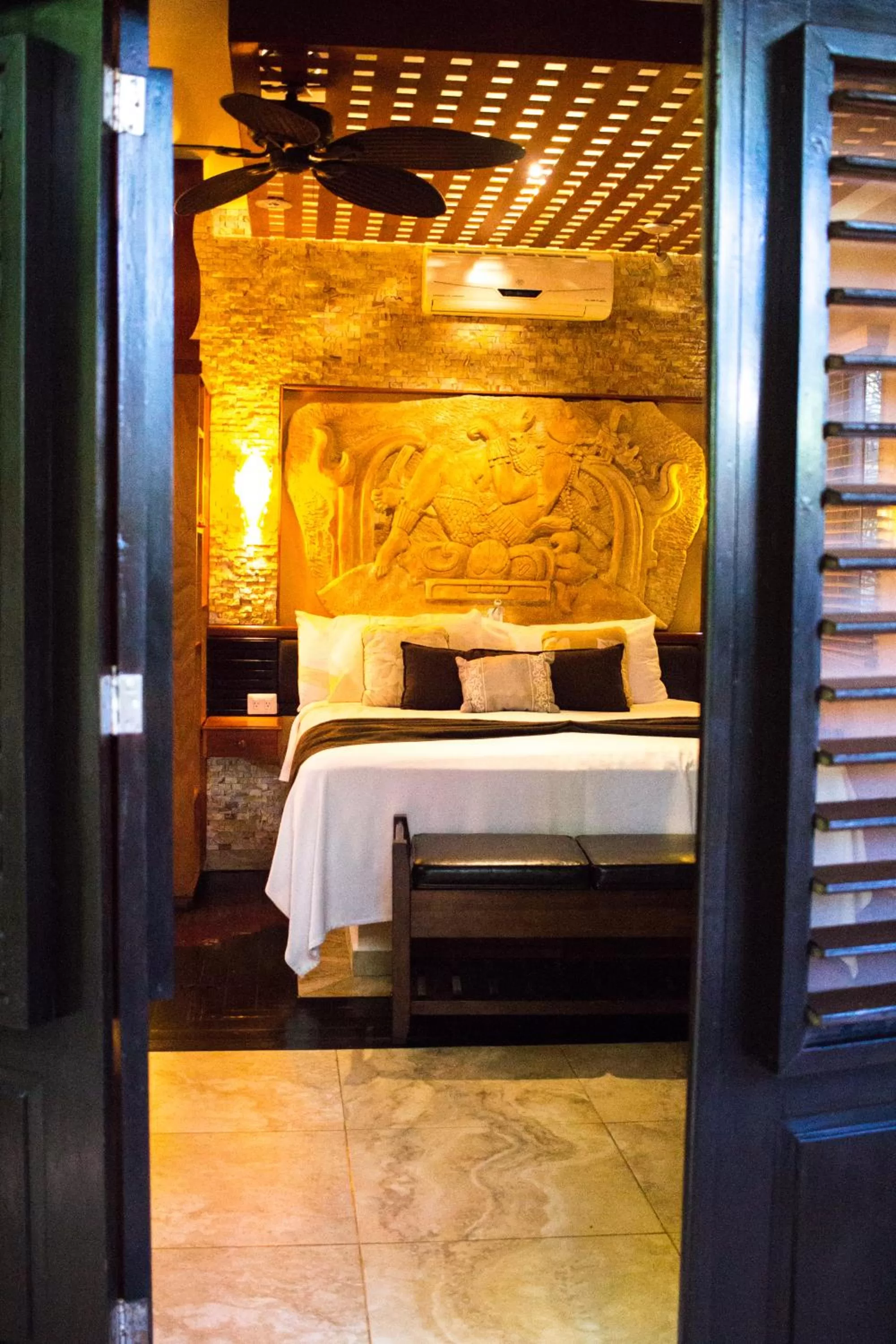 Photo of the whole room, Bed in Cocos Cabañas Playa del Carmen Adults Only