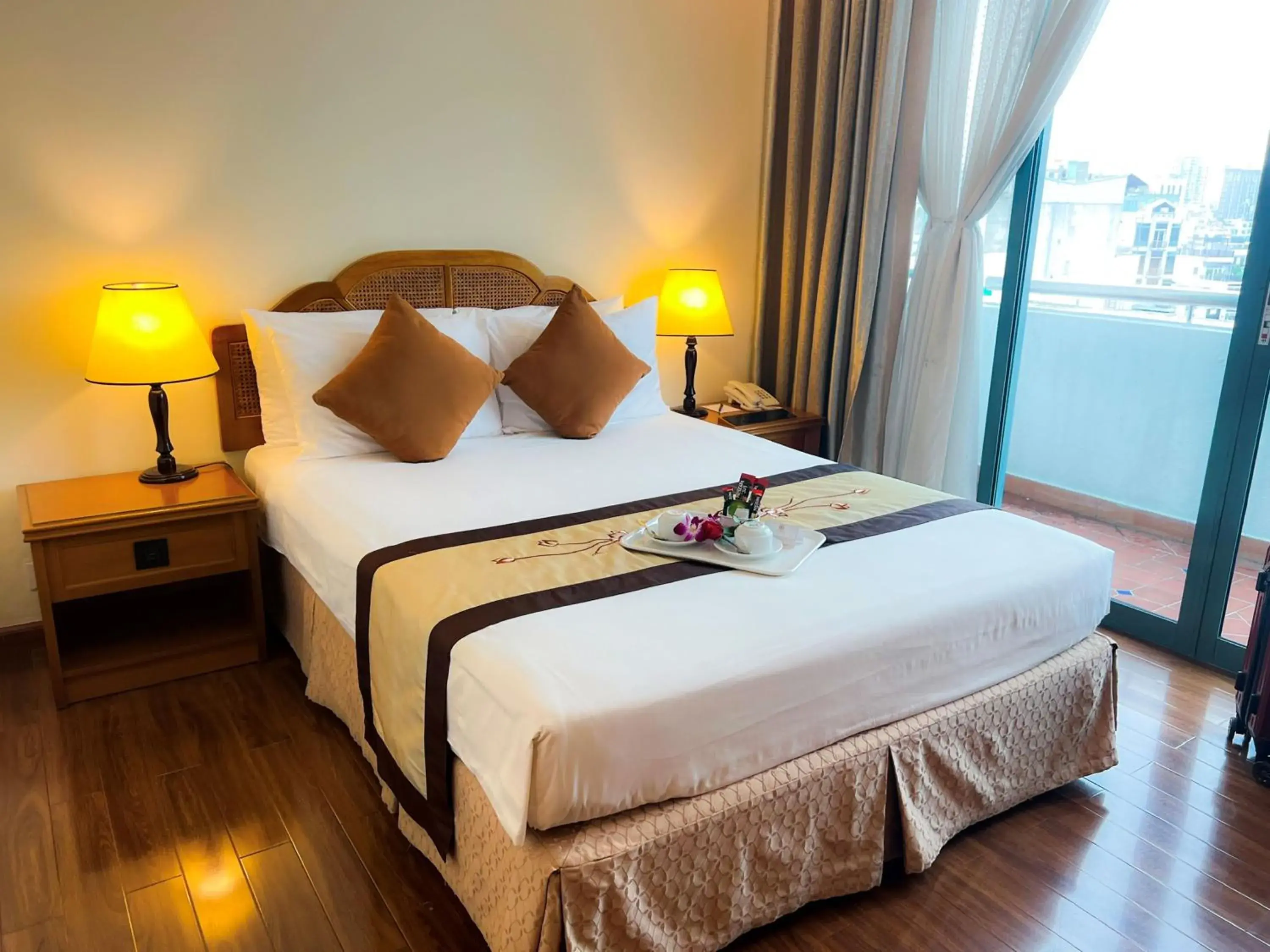 Bed in Ramana Saigon Hotel
