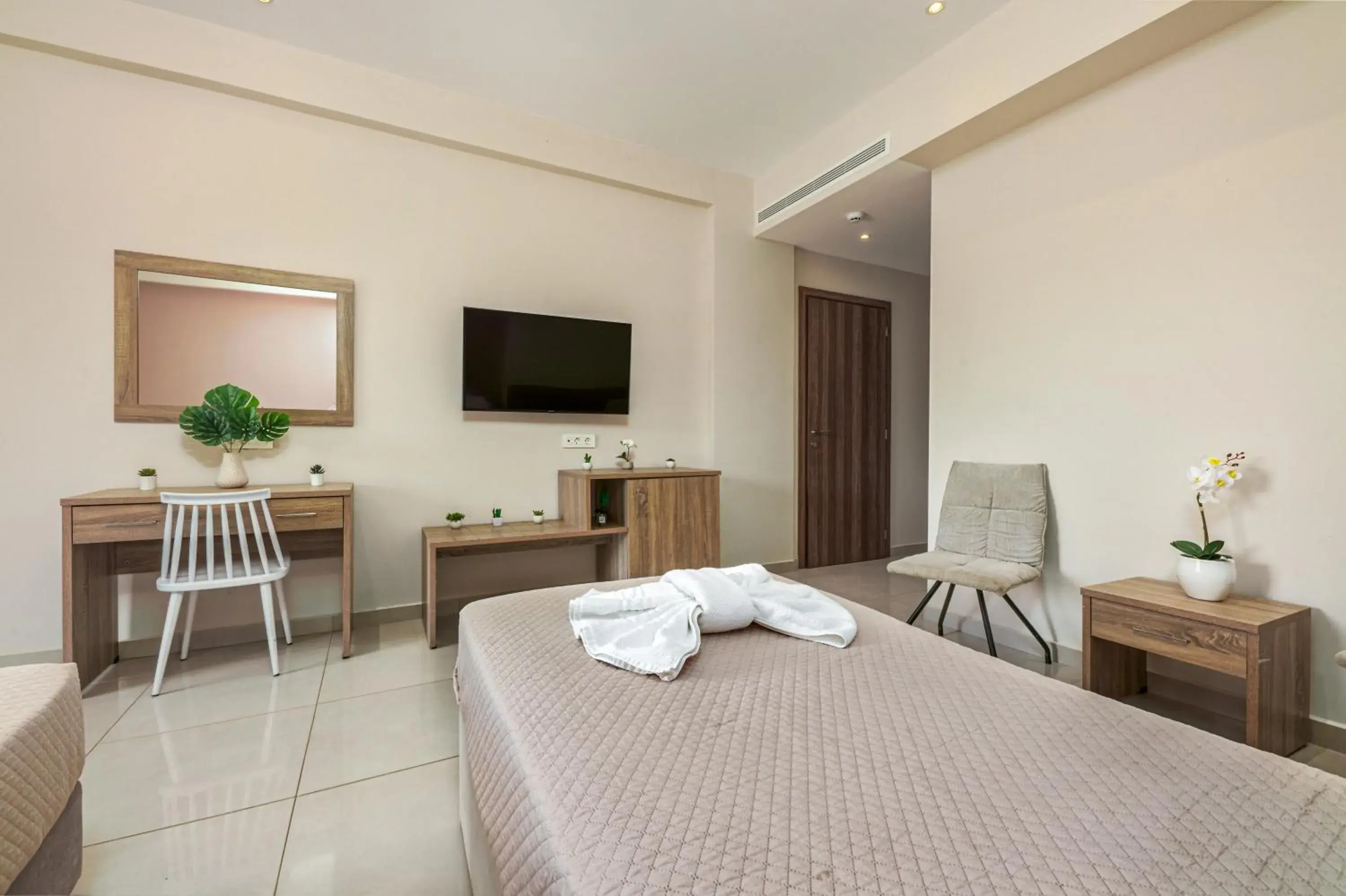 TV and multimedia, TV/Entertainment Center in Poseidon Beach Hotel