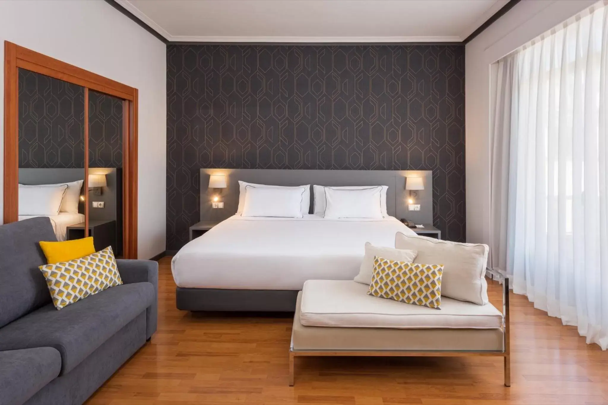 Photo of the whole room, Bed in Hotel Madrid Plaza de España, Affiliated by Meliá