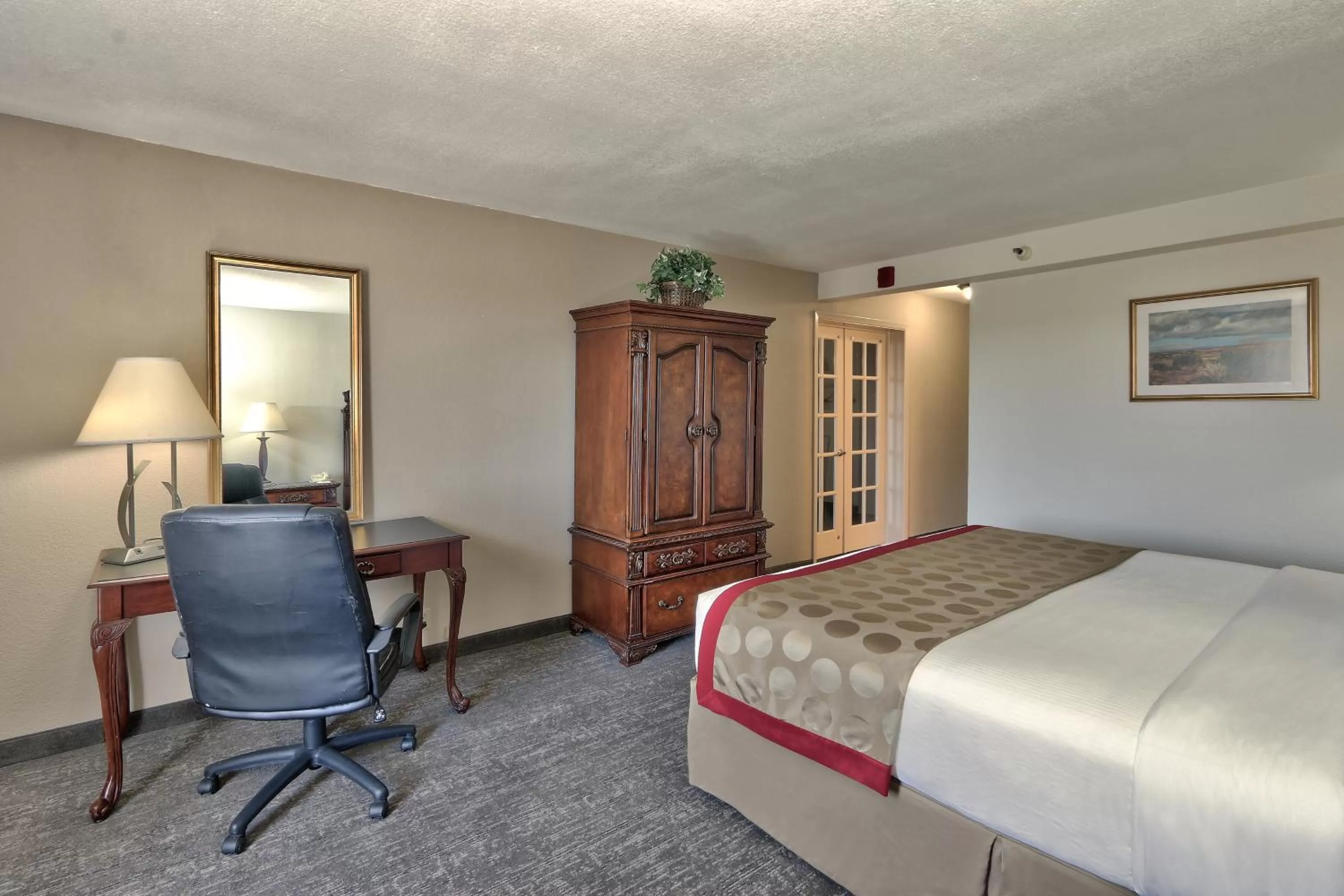 Bed in Ramada by Wyndham Albuquerque Midtown