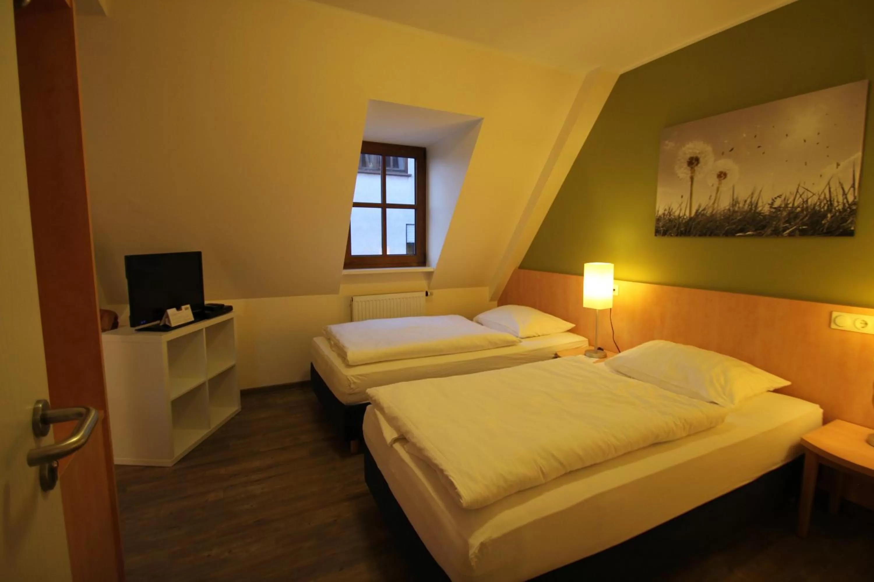 Photo of the whole room, Bed in Gasthof Weißes Roß