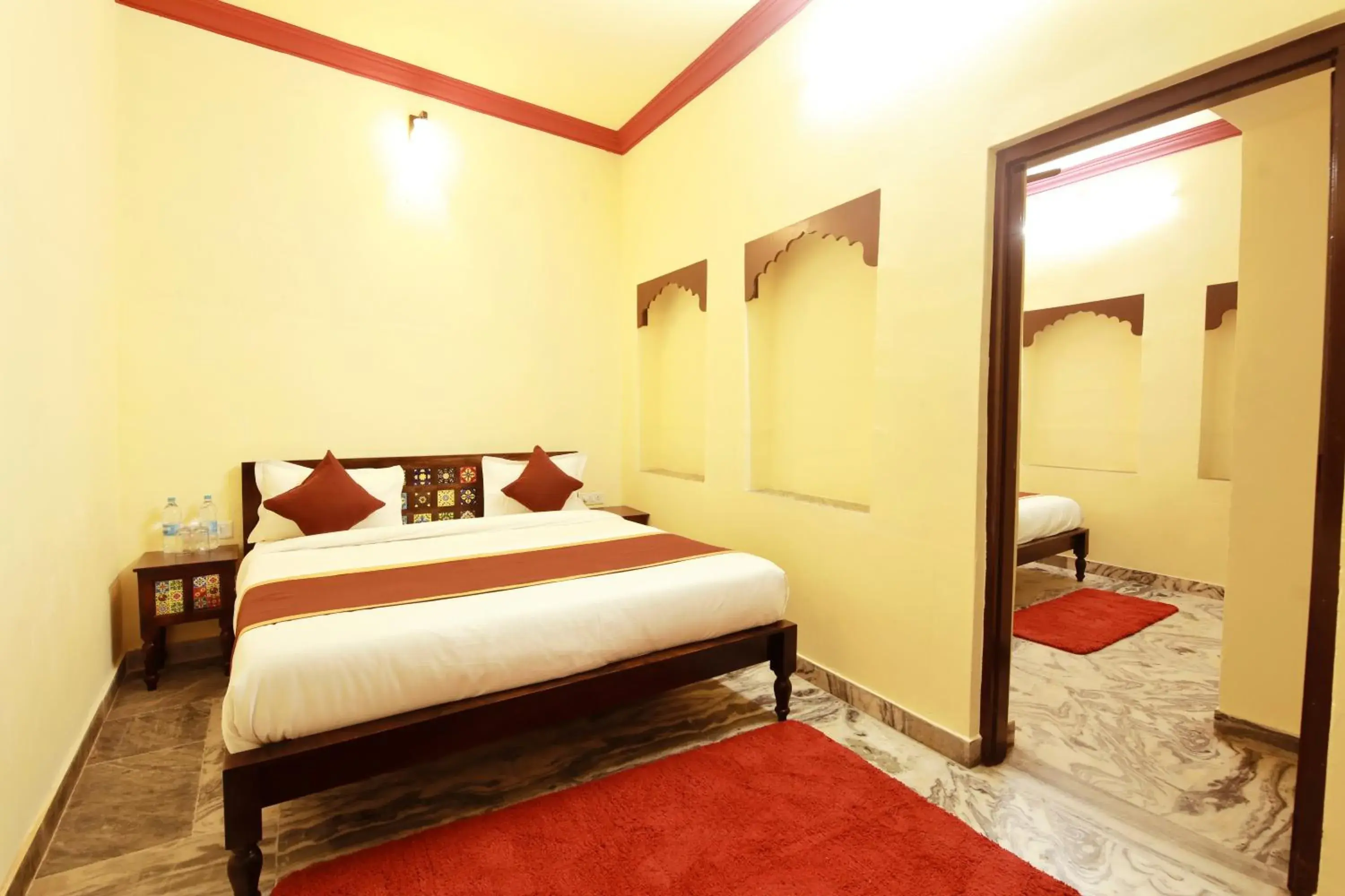 Bed in The Kanchangarh Resort