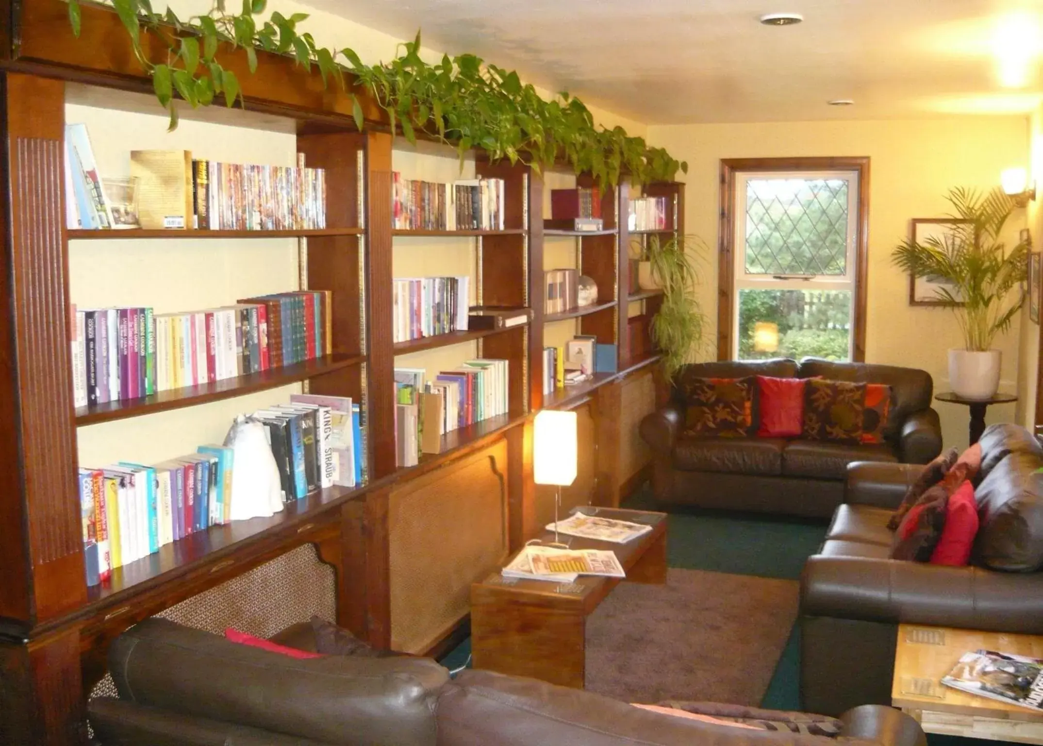 Communal lounge/ TV room, Library in Blackaddie House Hotel