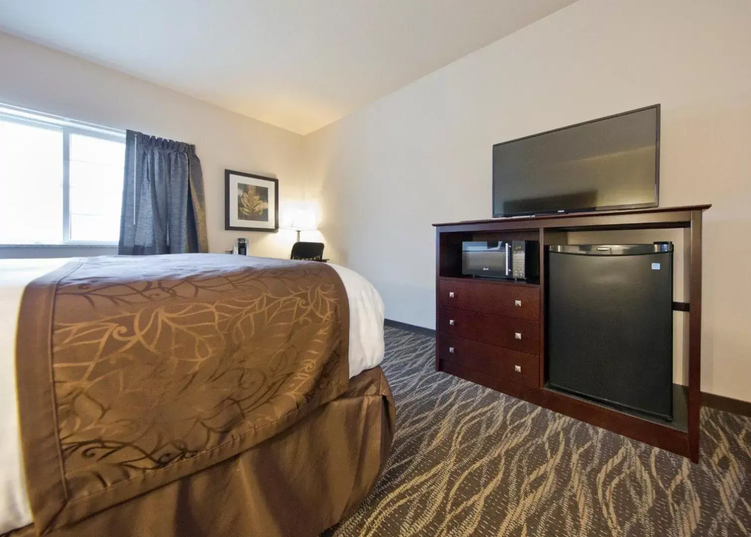 Bed in Cobblestone Inn & Suites -Clarinda