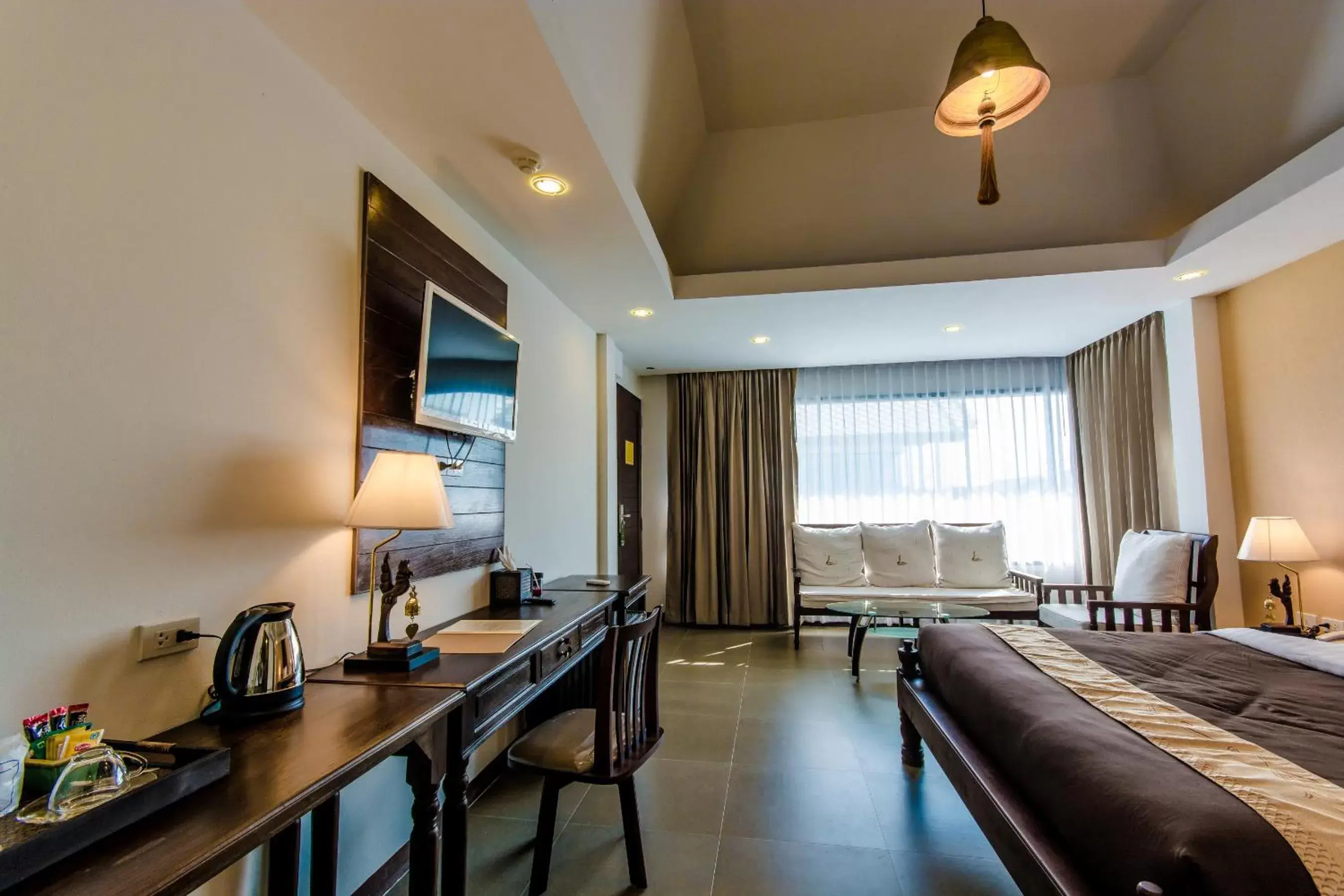 Bedroom, Seating Area in Goldenbell Hotel Chiangmai