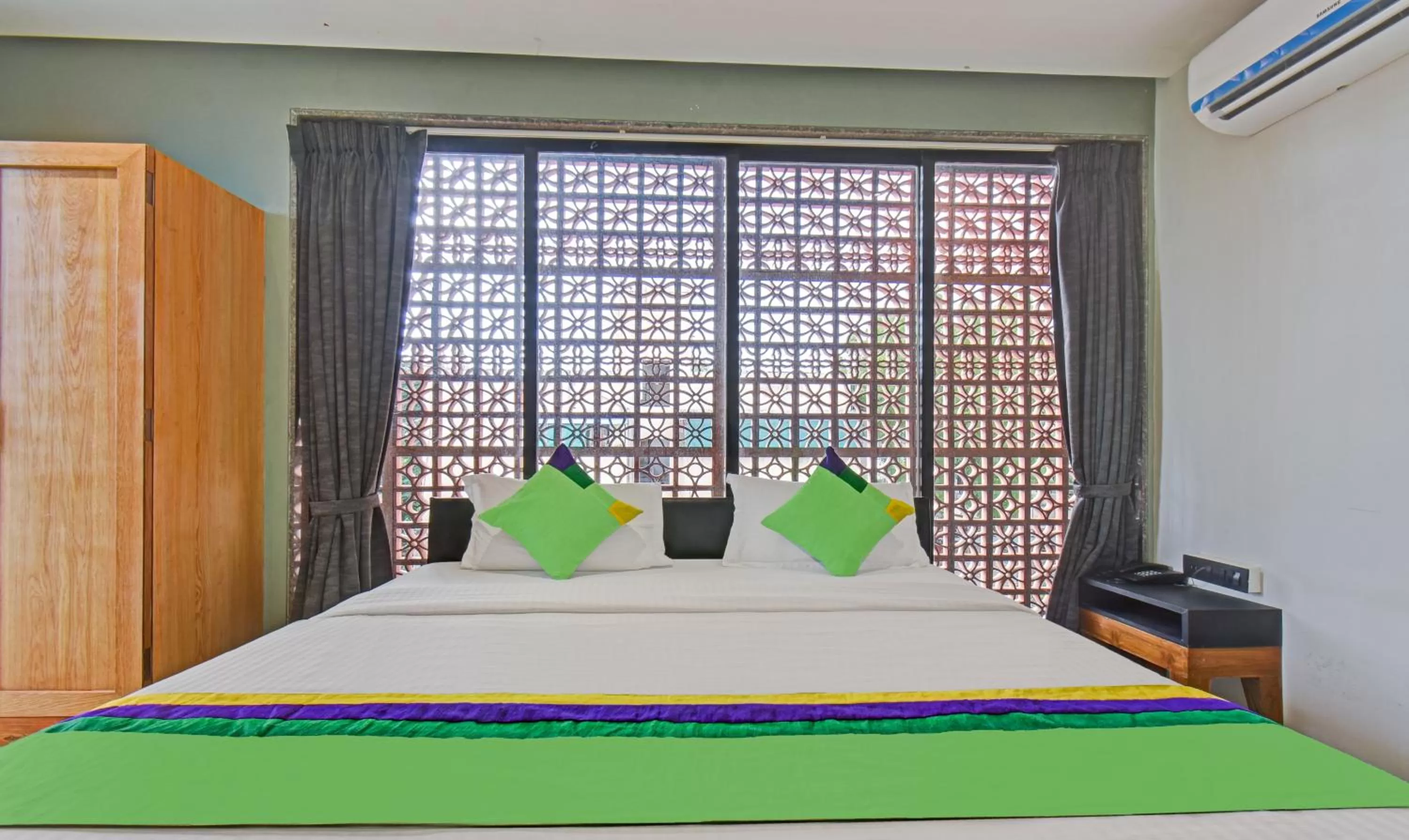 Bedroom, Bed in Treebo Aroma Executive