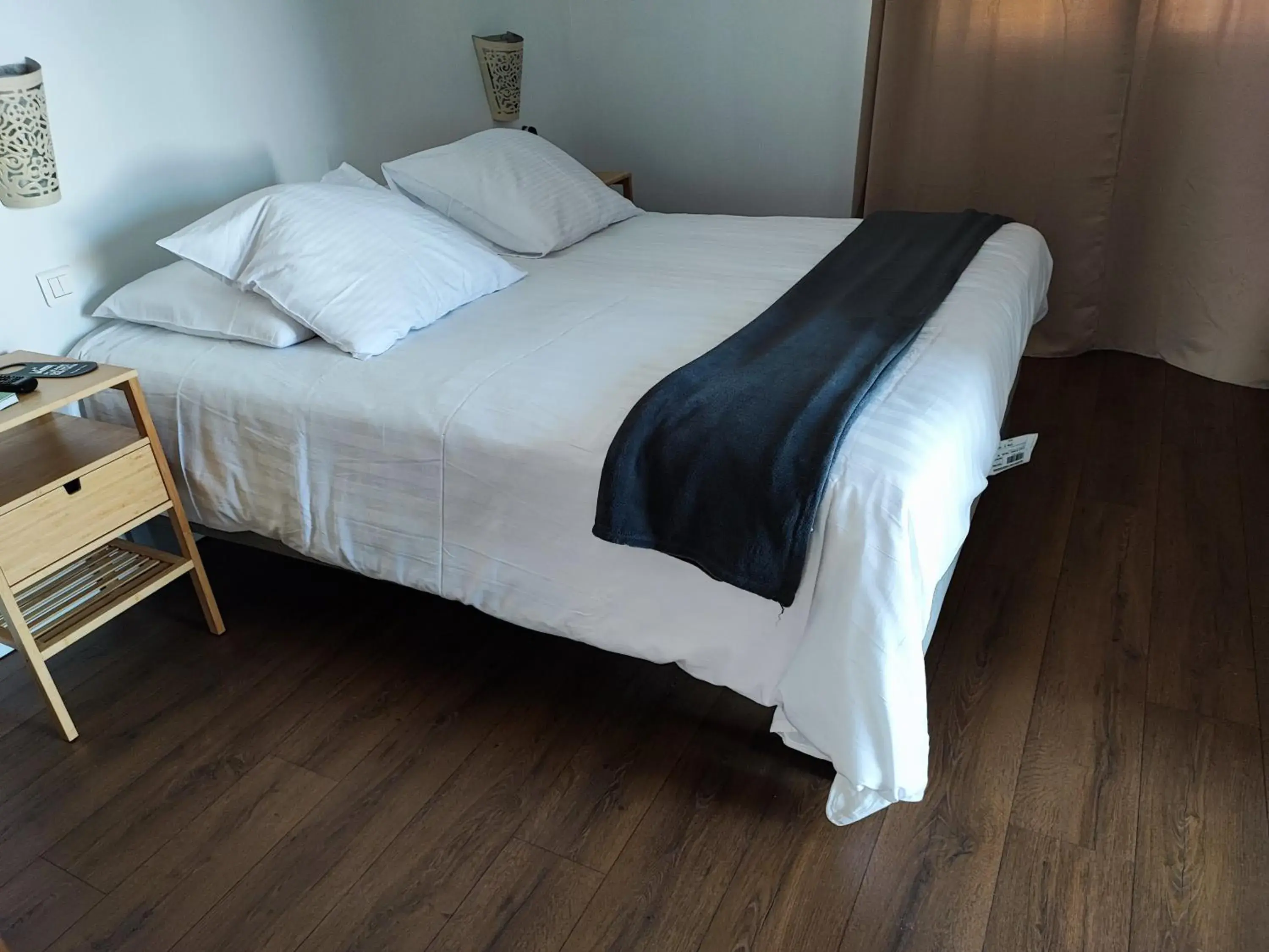 Bed in Logis Hotel De La Clape