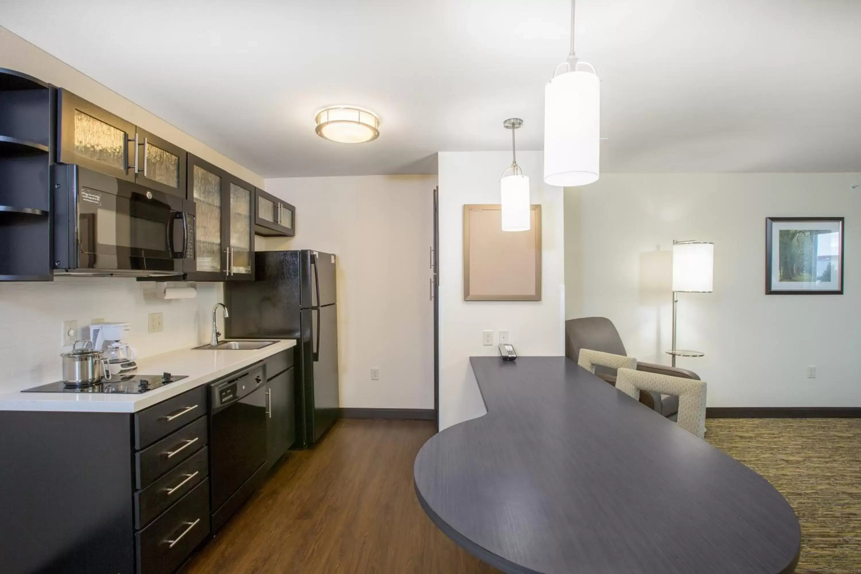 Photo of the whole room, Kitchen/Kitchenette in Candlewood Suites - Omaha Millard Area, an IHG Hotel