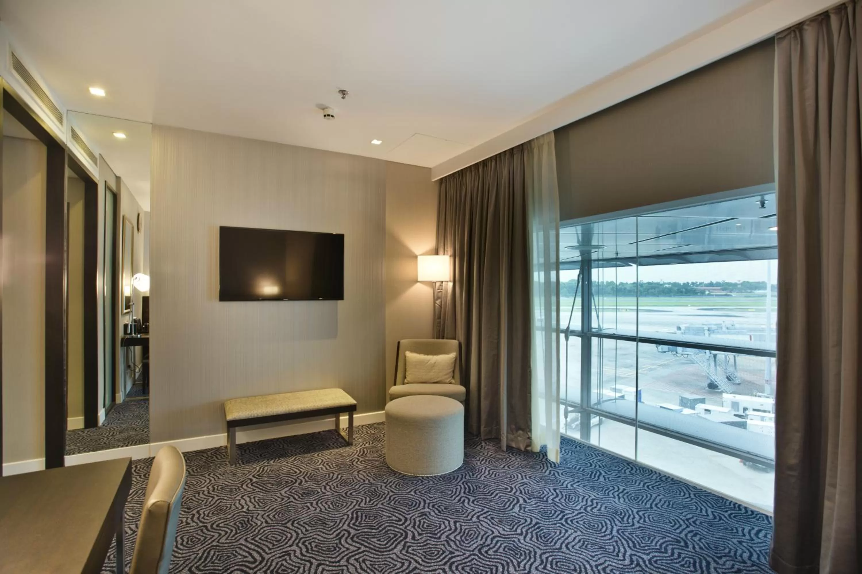 Bedroom, TV/Entertainment Center in Ambassador Transit Hotel - Terminal 3