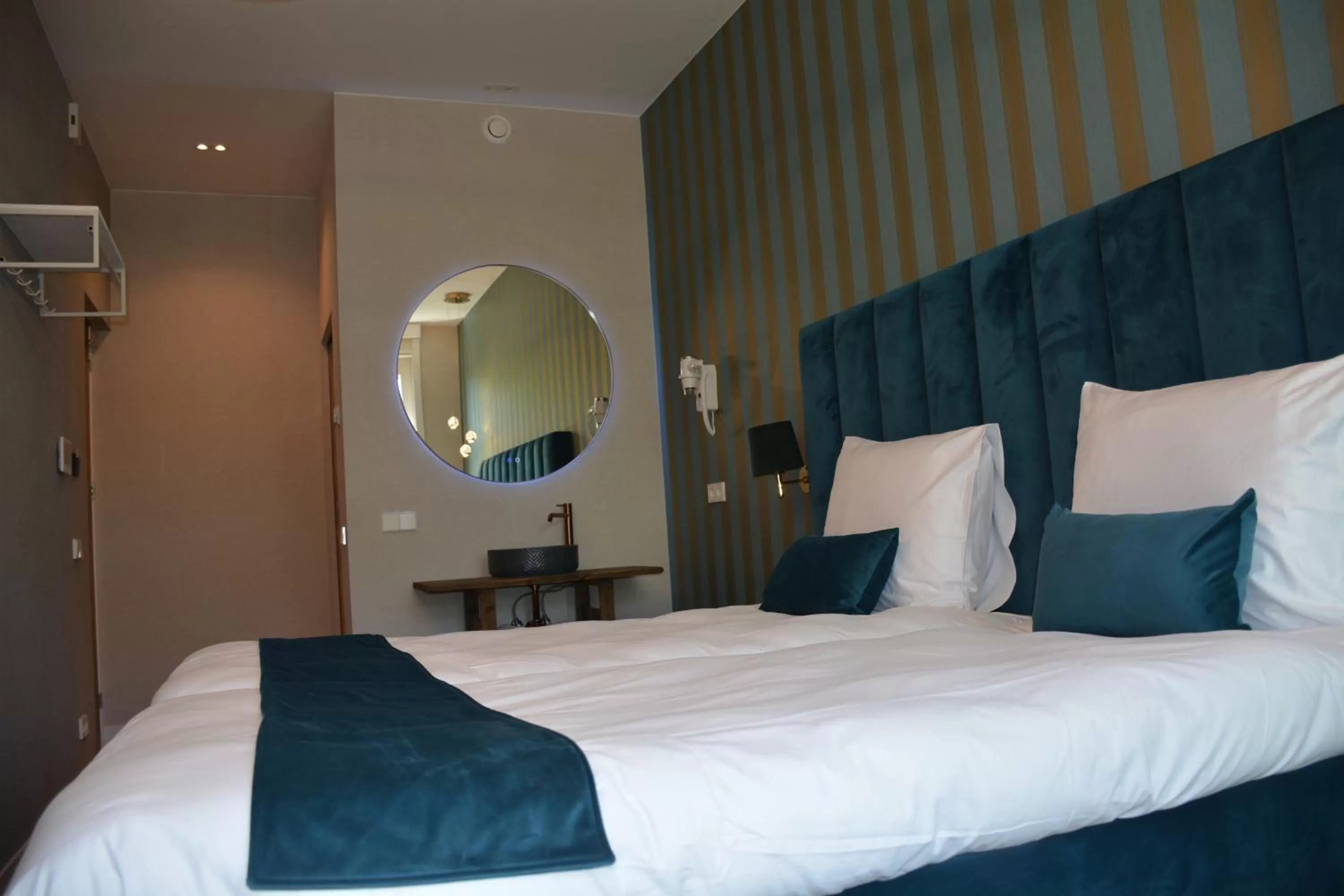 Bed in The IF Boutique hotel