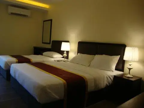 Photo of the whole room, Bed in DM Hotel Photo of the whole room, Bed in DM Hotel