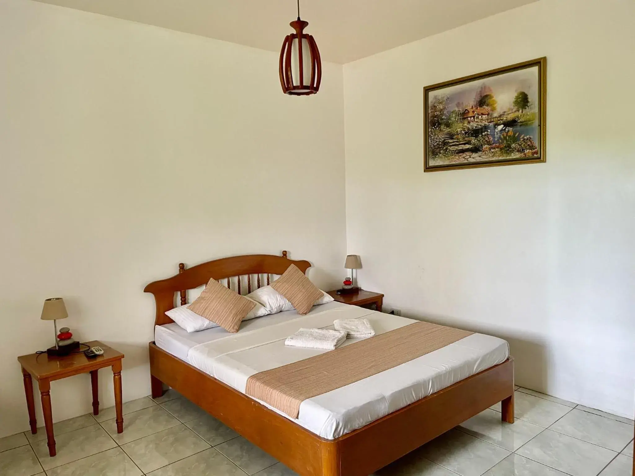 Bedroom, Bed in Lapu-Lapu Cottages