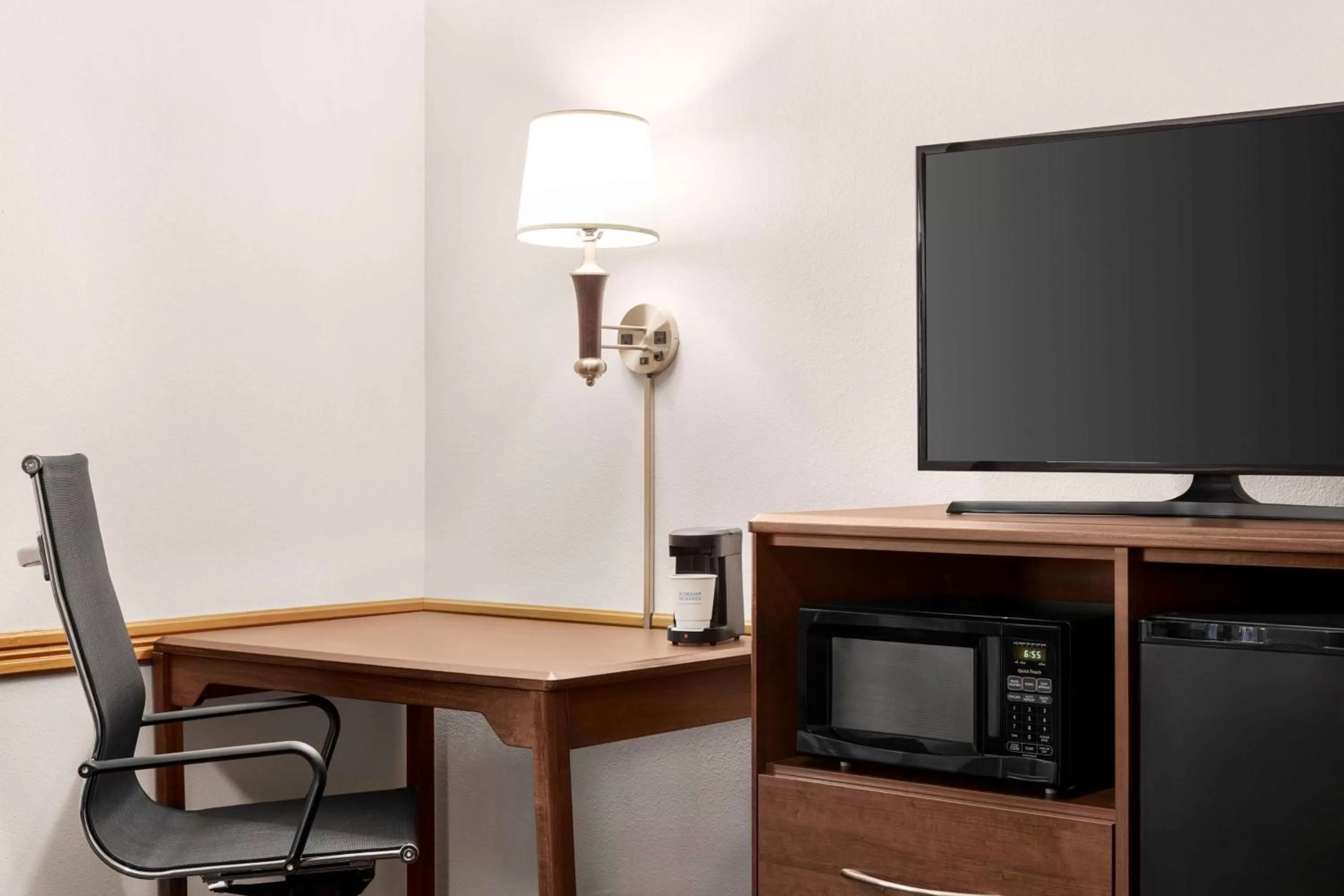 Bed in AmericInn by Wyndham Baudette