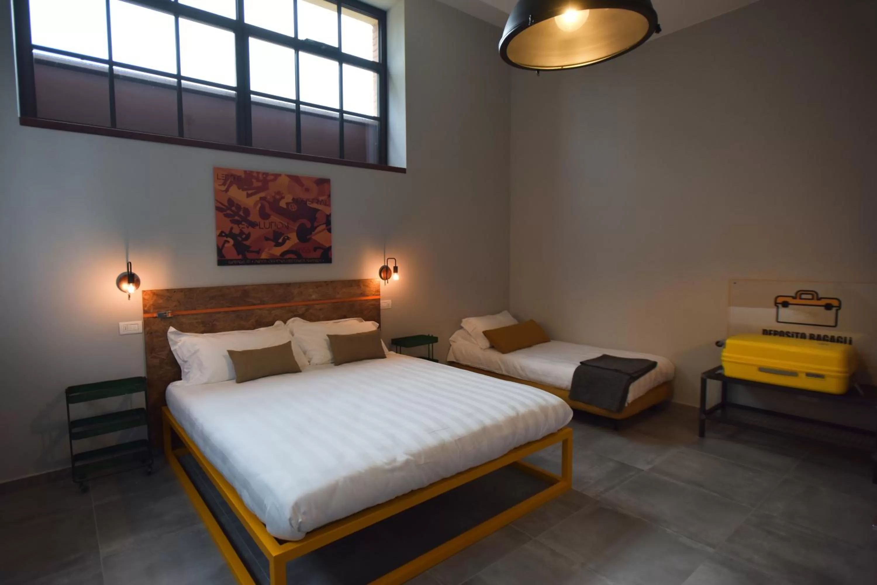 Bed in GARAGE47 Storica Officina Meccanica LOFT B&B iN PIENZA