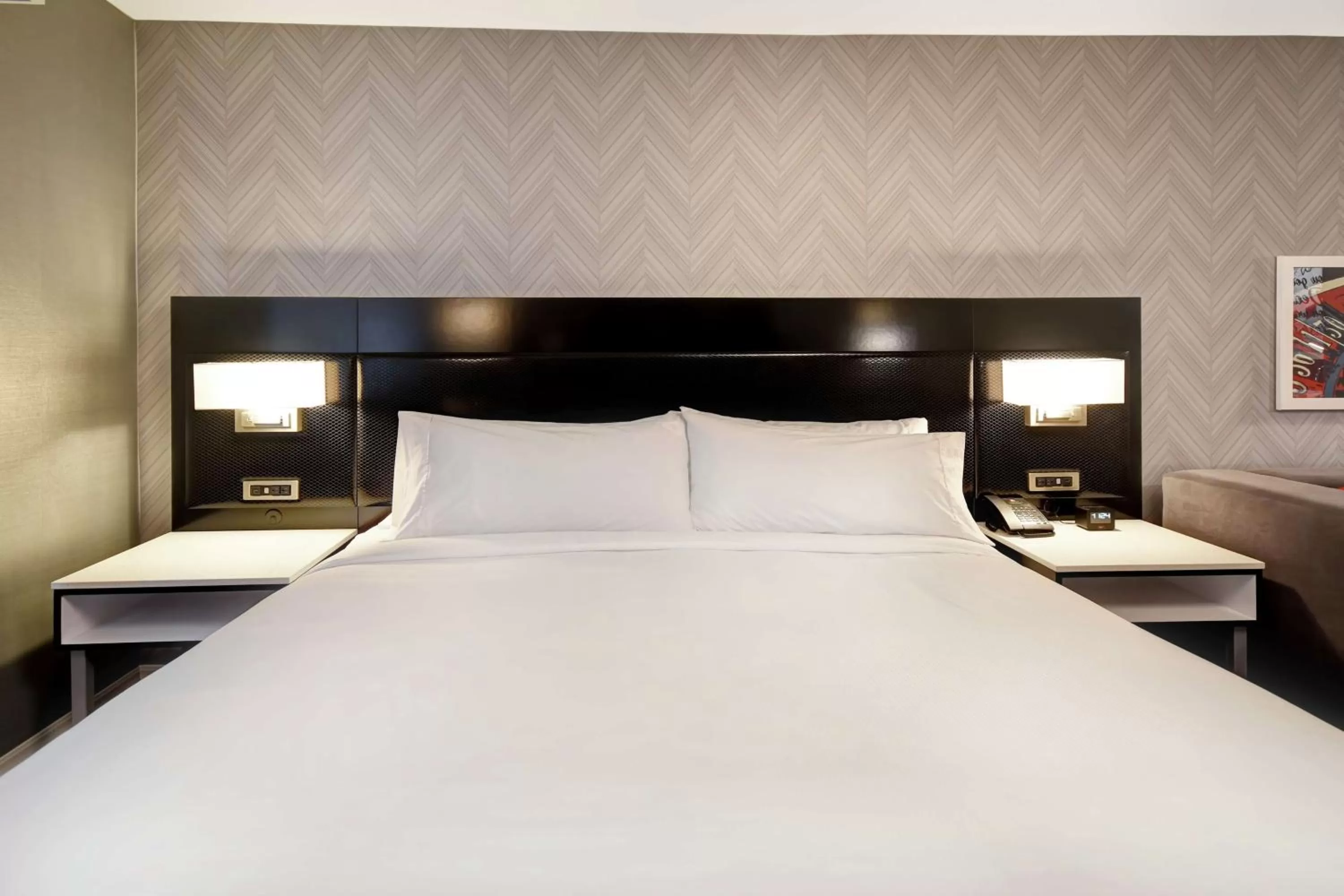 Bed in DoubleTree by Hilton Deadwood at Cadillac Jack's