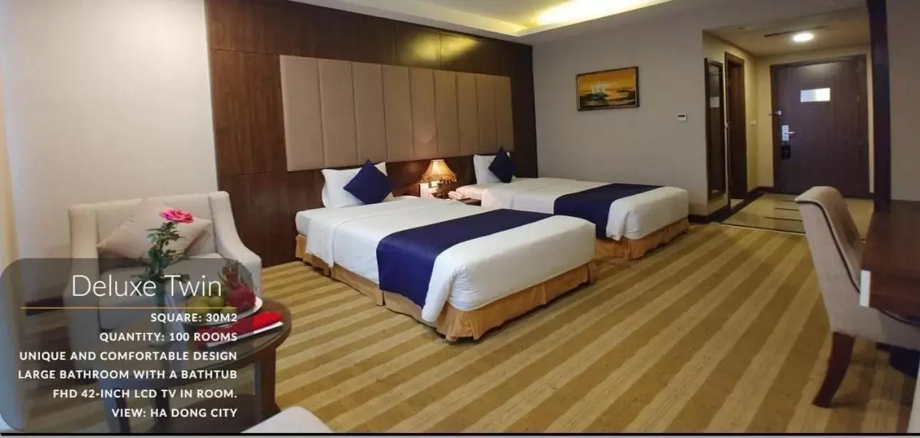 Bed in Muong Thanh Grand Xa La Hotel