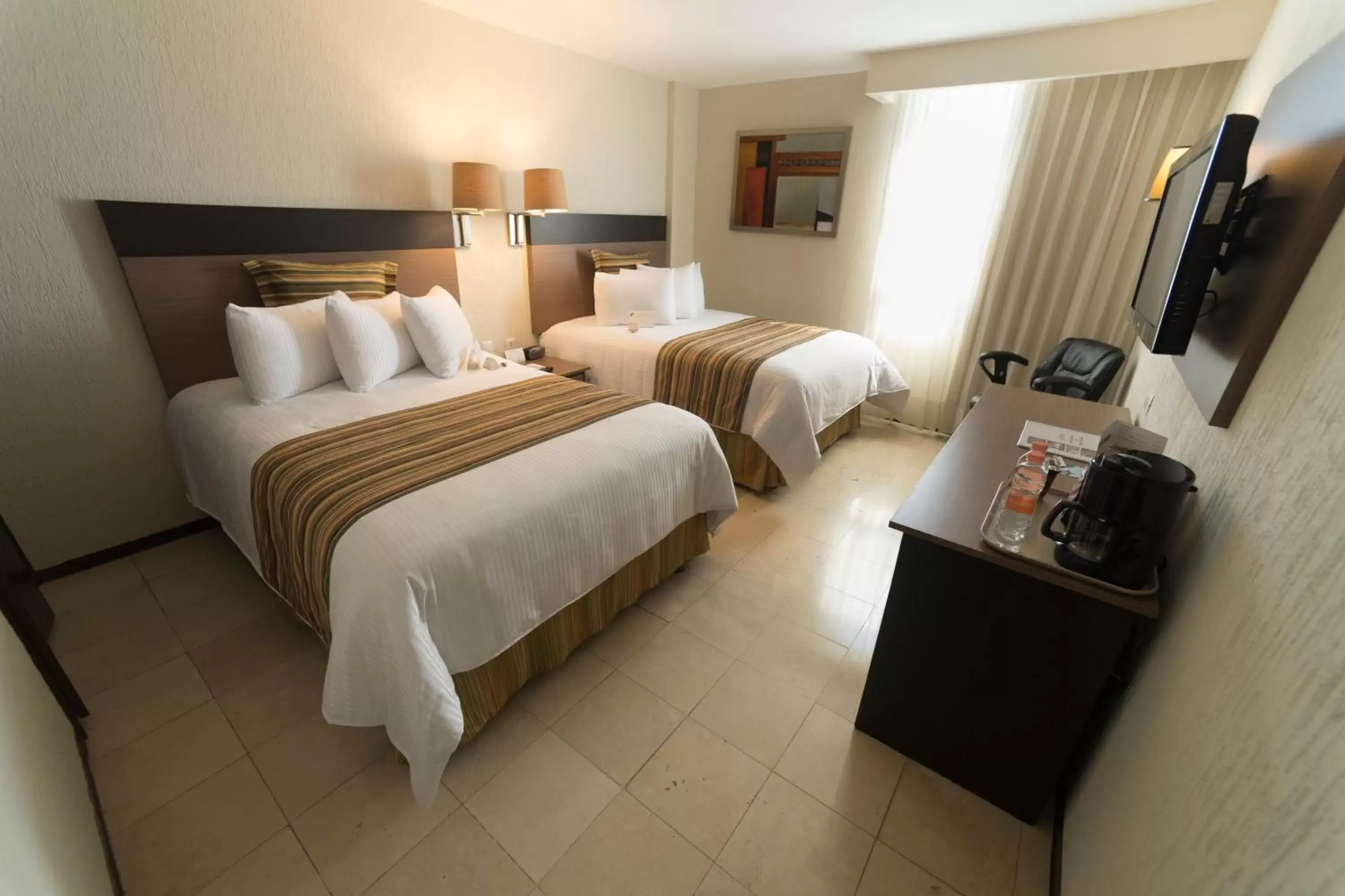 Bed in Ramada Hola Culiacan