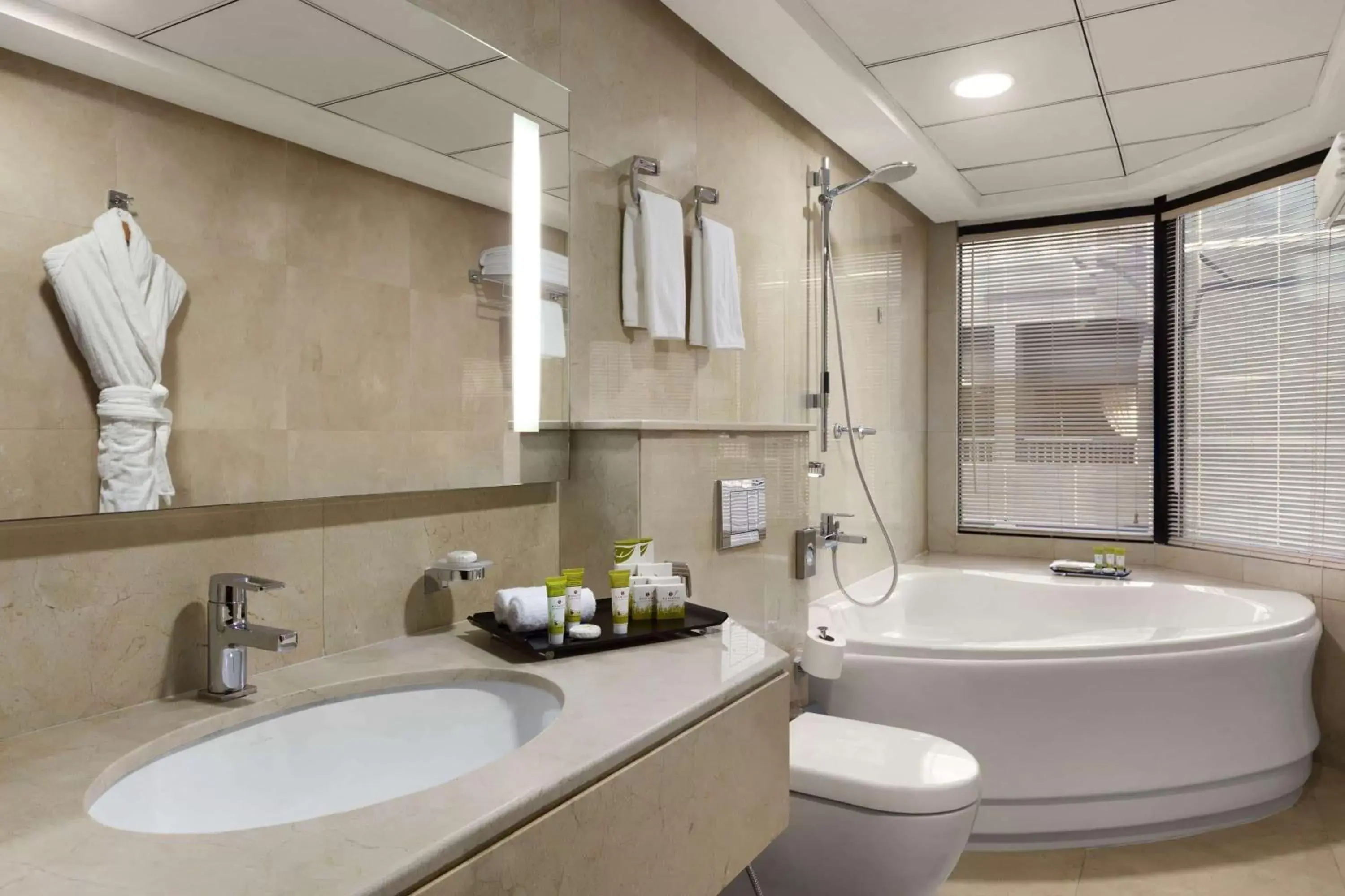 Photo of the whole room, Bathroom in Ramada Hotel & Suites by Wyndham Ajman