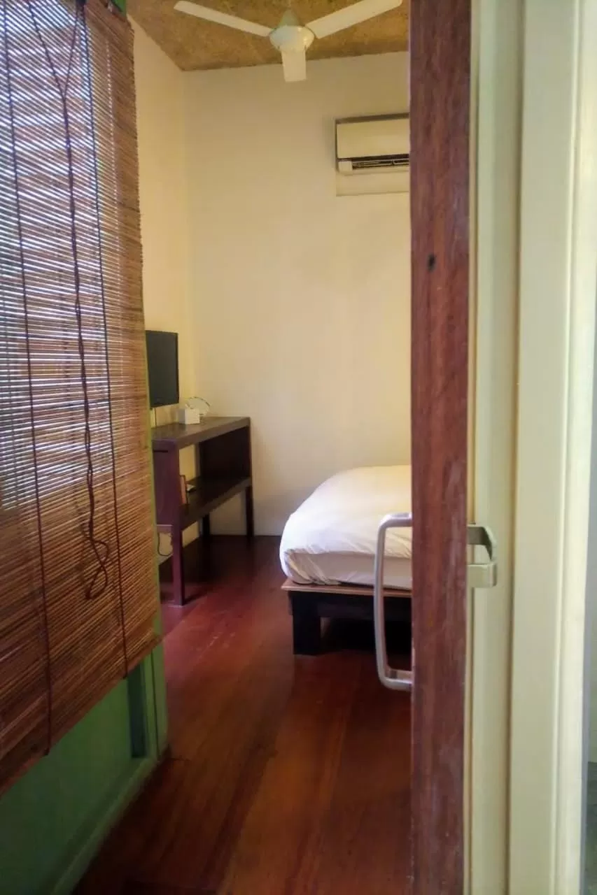 Bed in Ren I Tang Heritage Inn