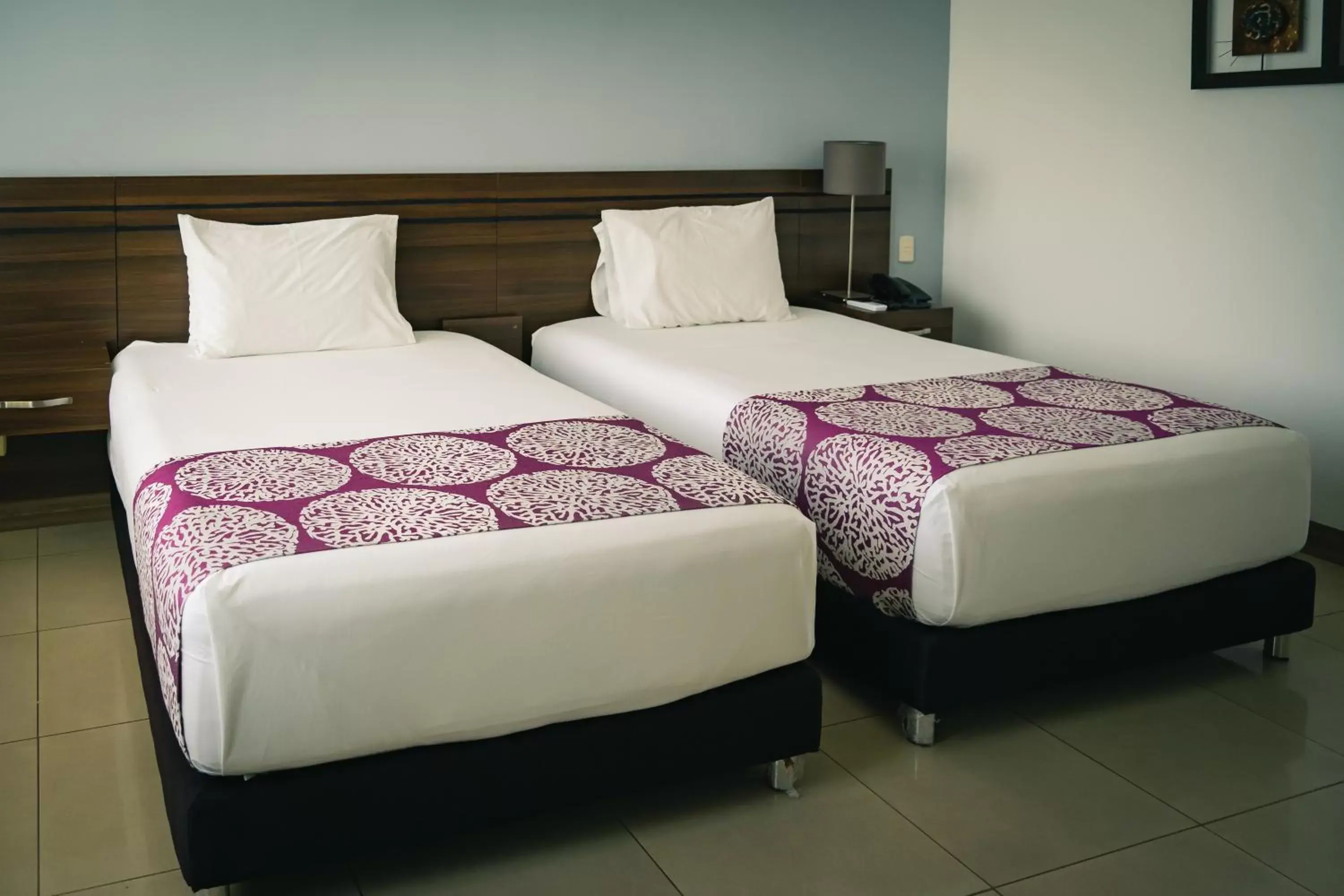 Bed in Malik Hotel Boutique