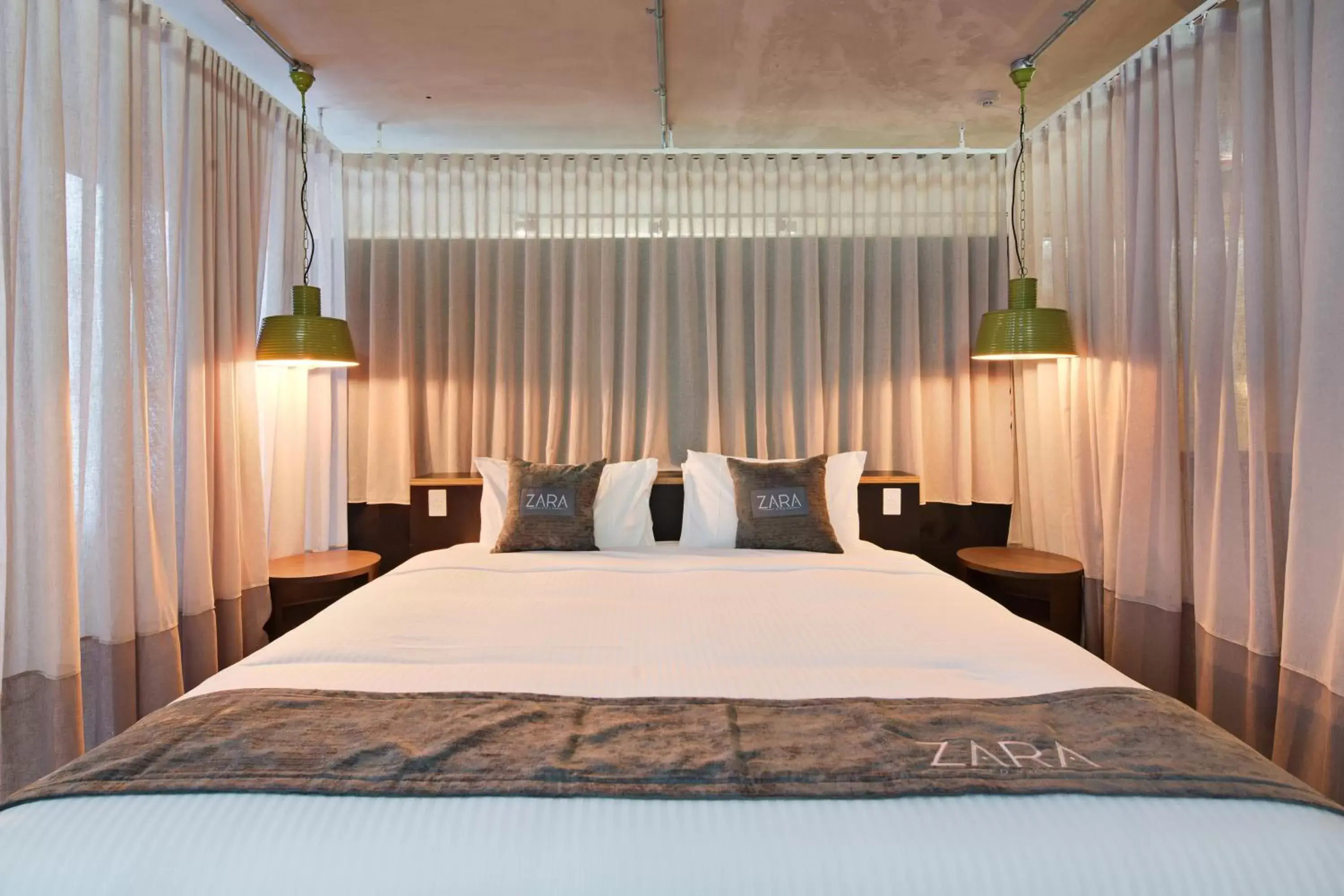 Bed in Zara Tower – Luxury Suites and Apartments