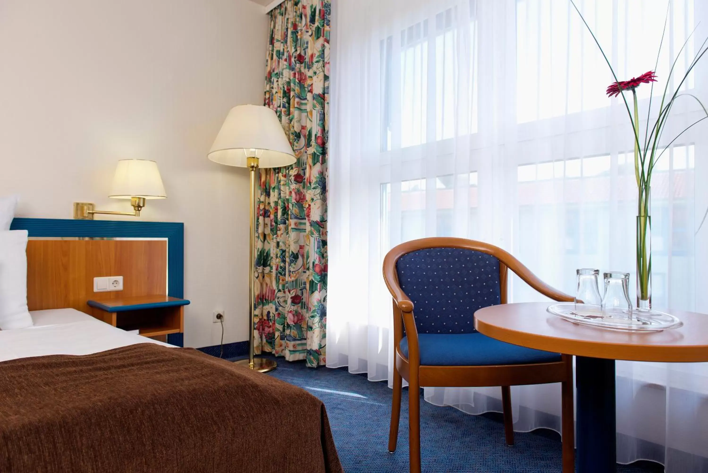 Photo of the whole room, Bed in Wyndham Garden Wismar