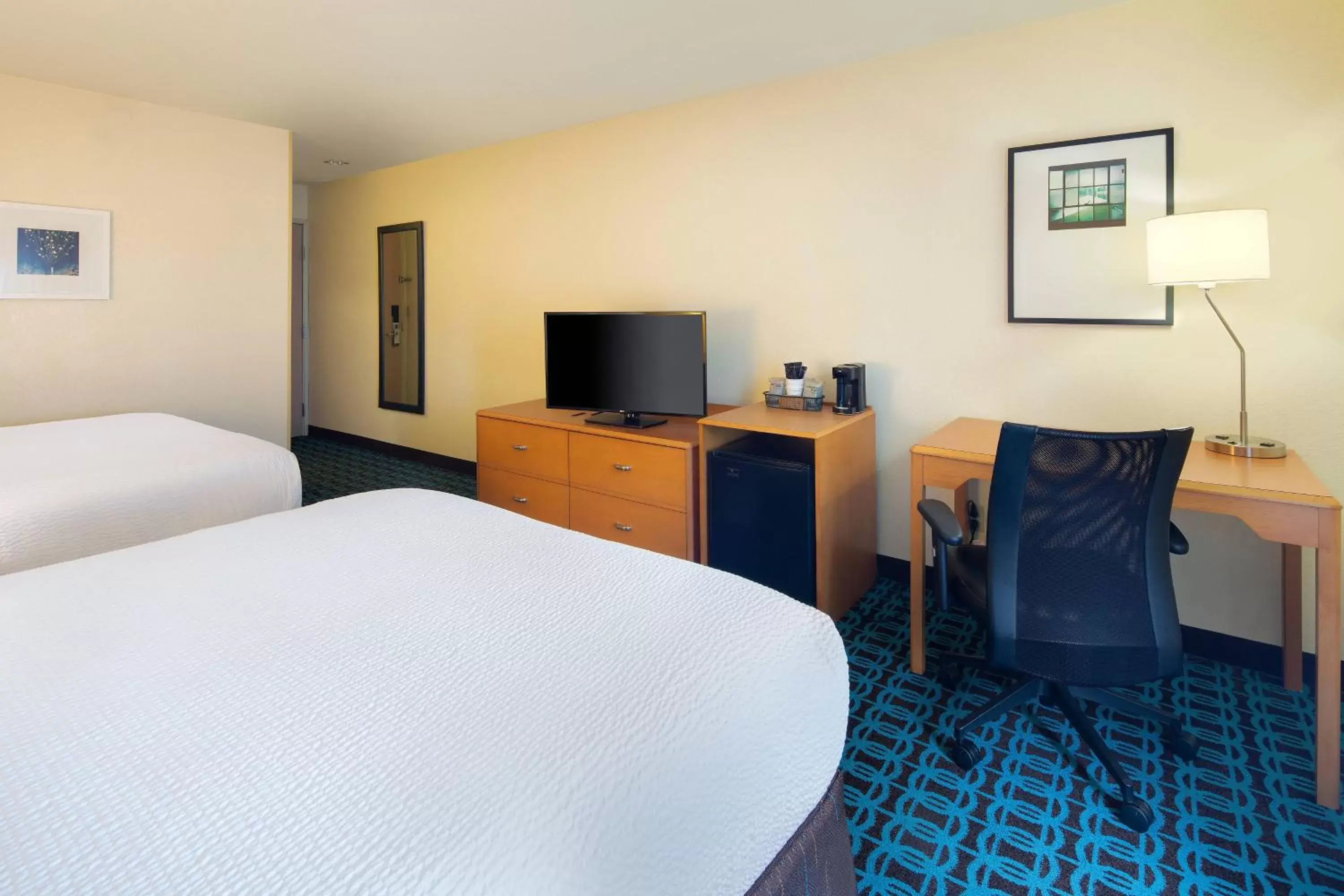 Photo of the whole room, TV/Entertainment Center in Fairfield Inn & Suites Indianapolis Airport